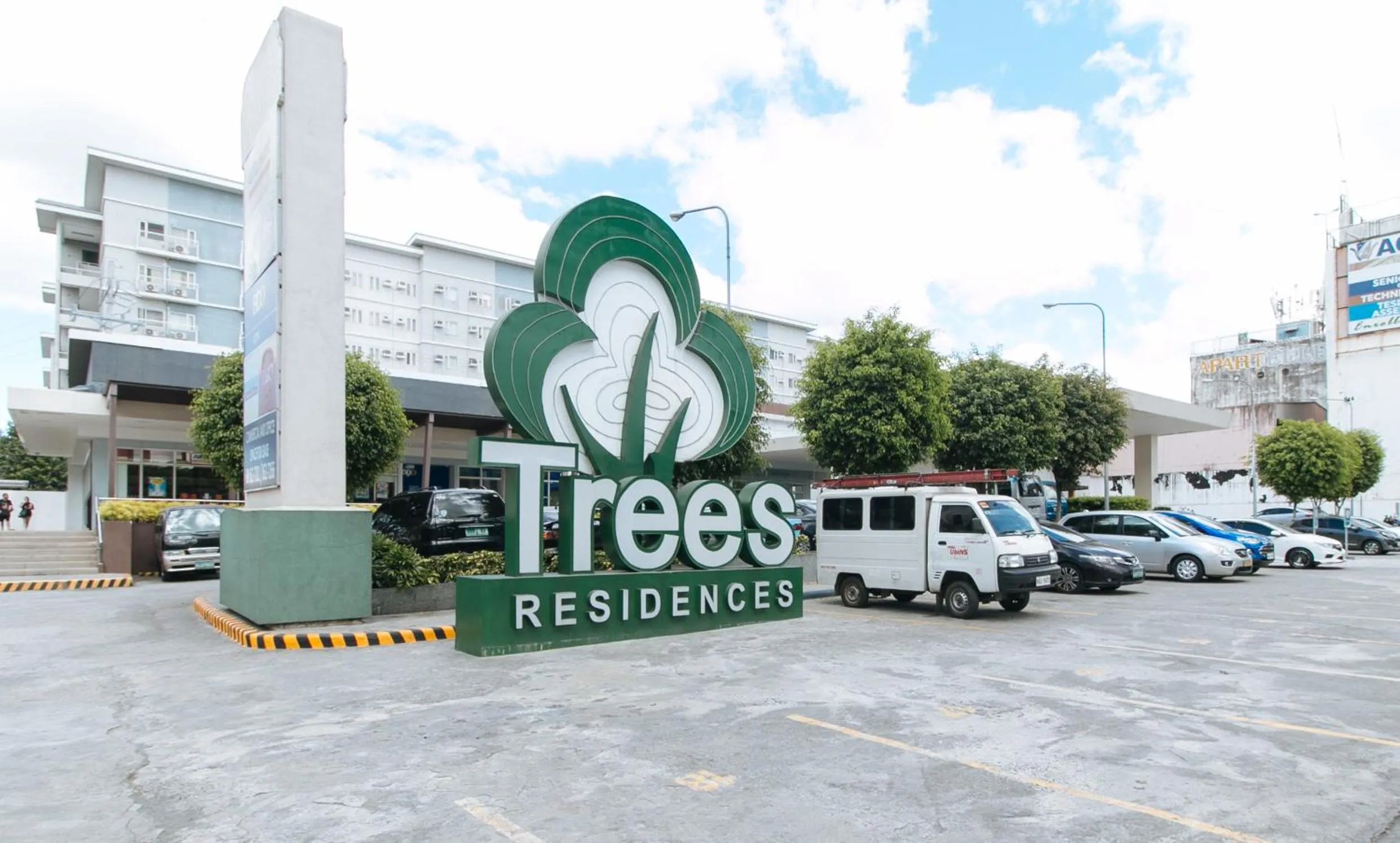 Property logo or sign in Jamah's Staycation at SMDC Trees Residences by RedDoorz