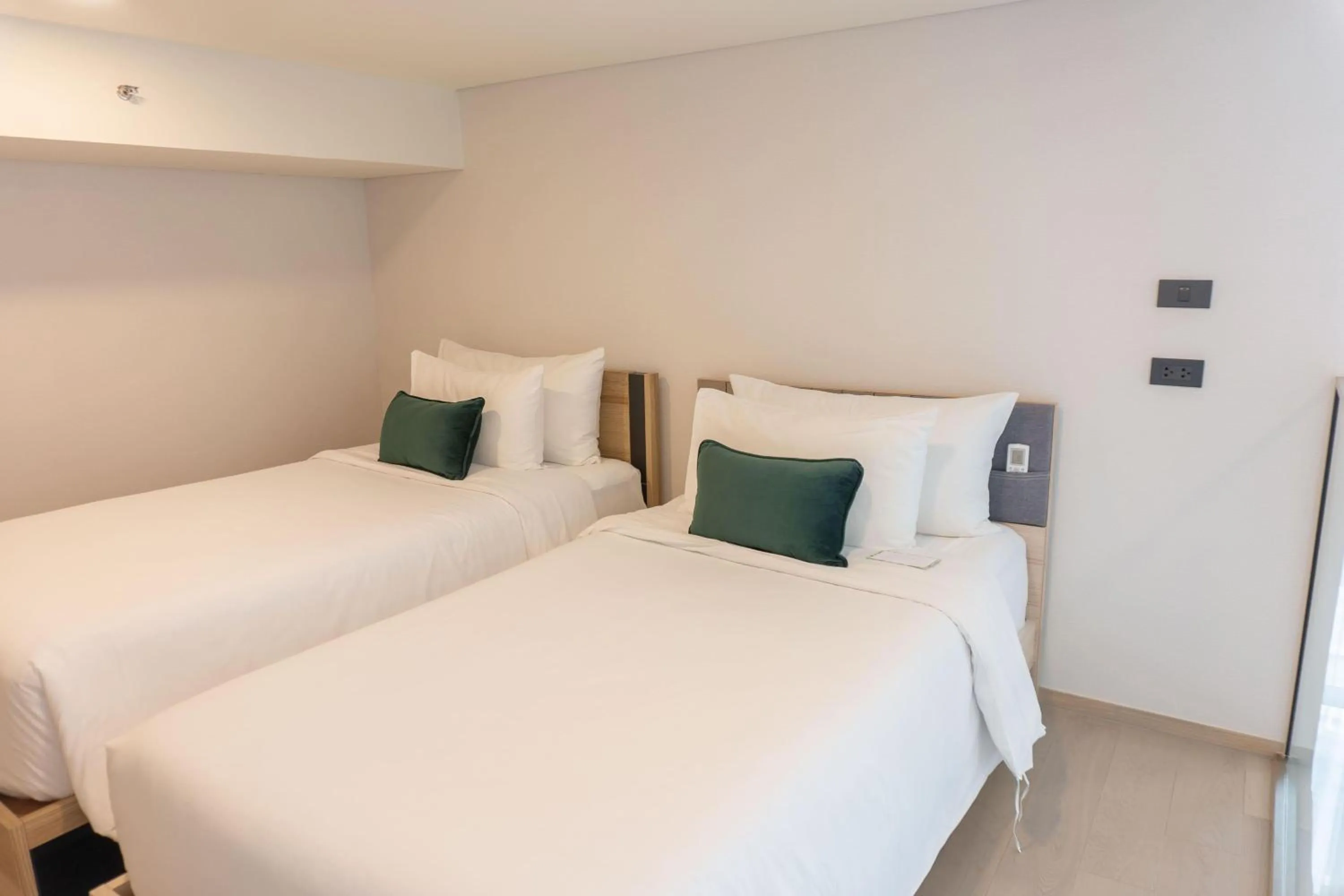 Photo of the whole room, Bed in Wyndham Garden Bangkok Sukhumvit 42