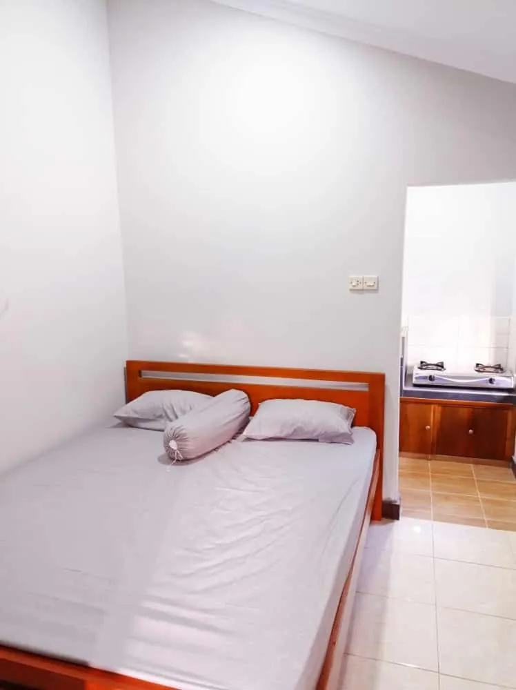 Bed in Angler Homestay & Joglo
