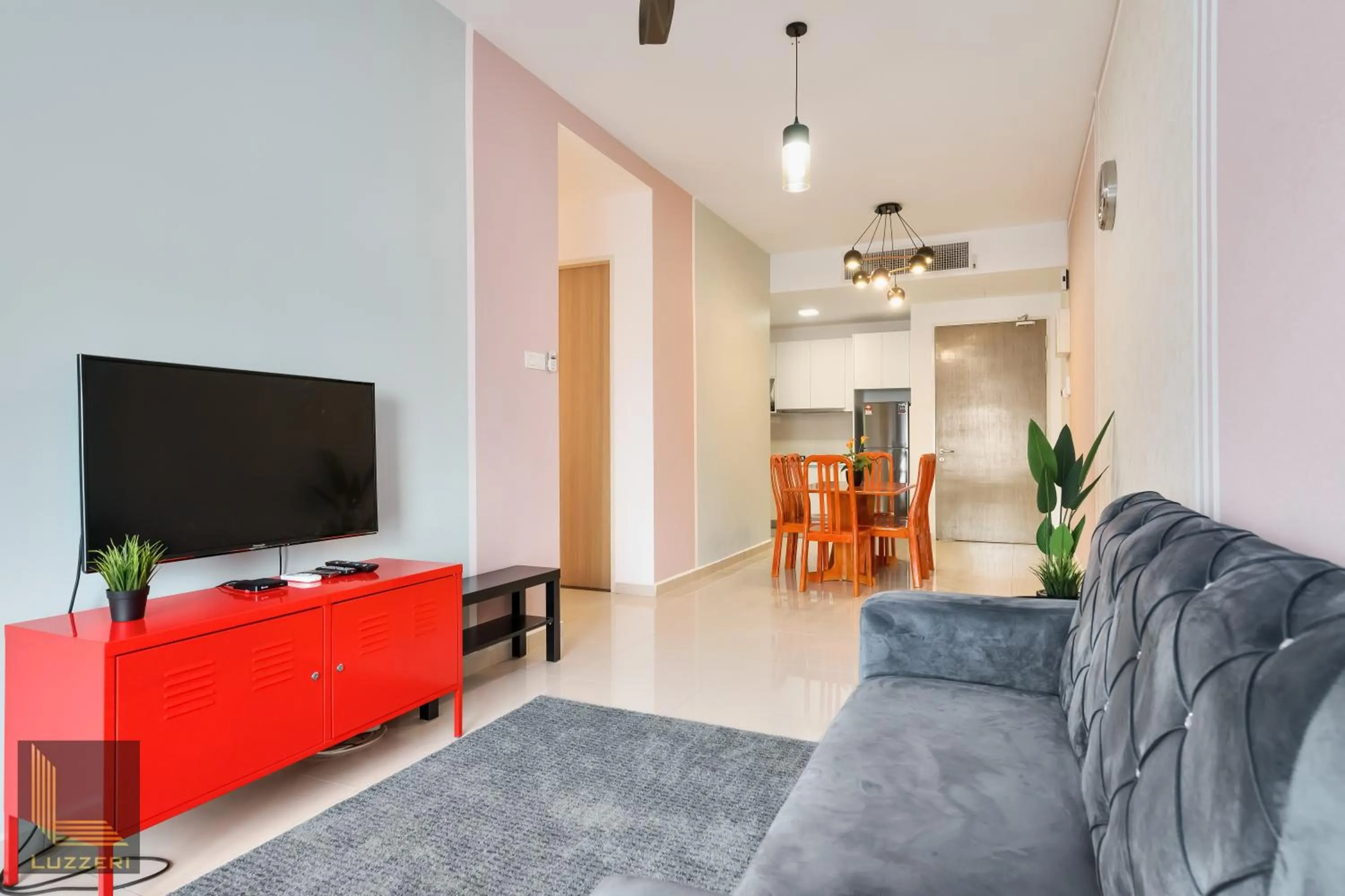 Communal lounge/ TV room in Legasi Kampung Baru Guesthouse