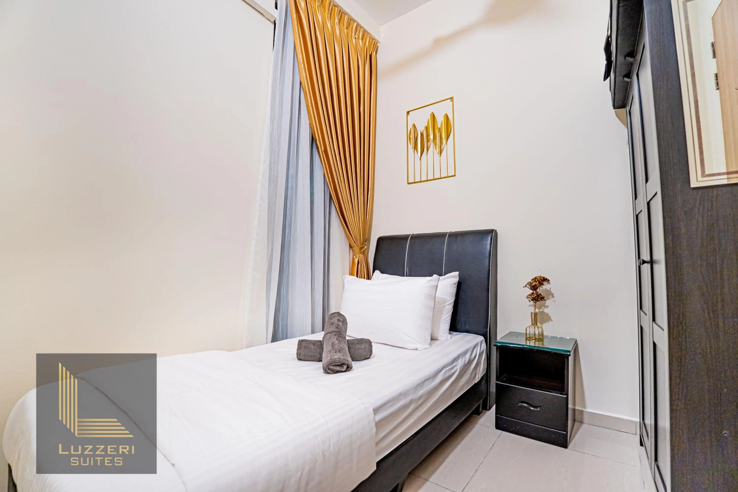 Bed in Legasi Kampung Baru Guesthouse