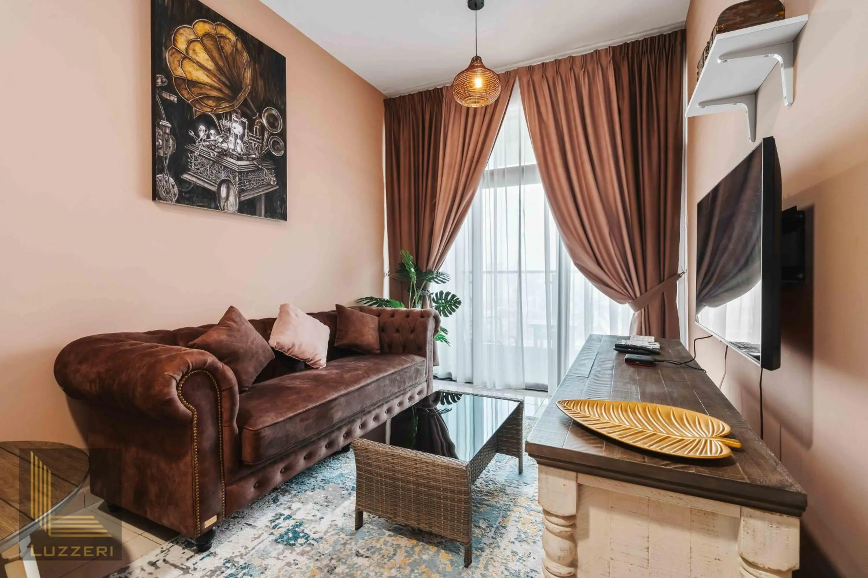 Living room in Legasi Kampung Baru Guesthouse