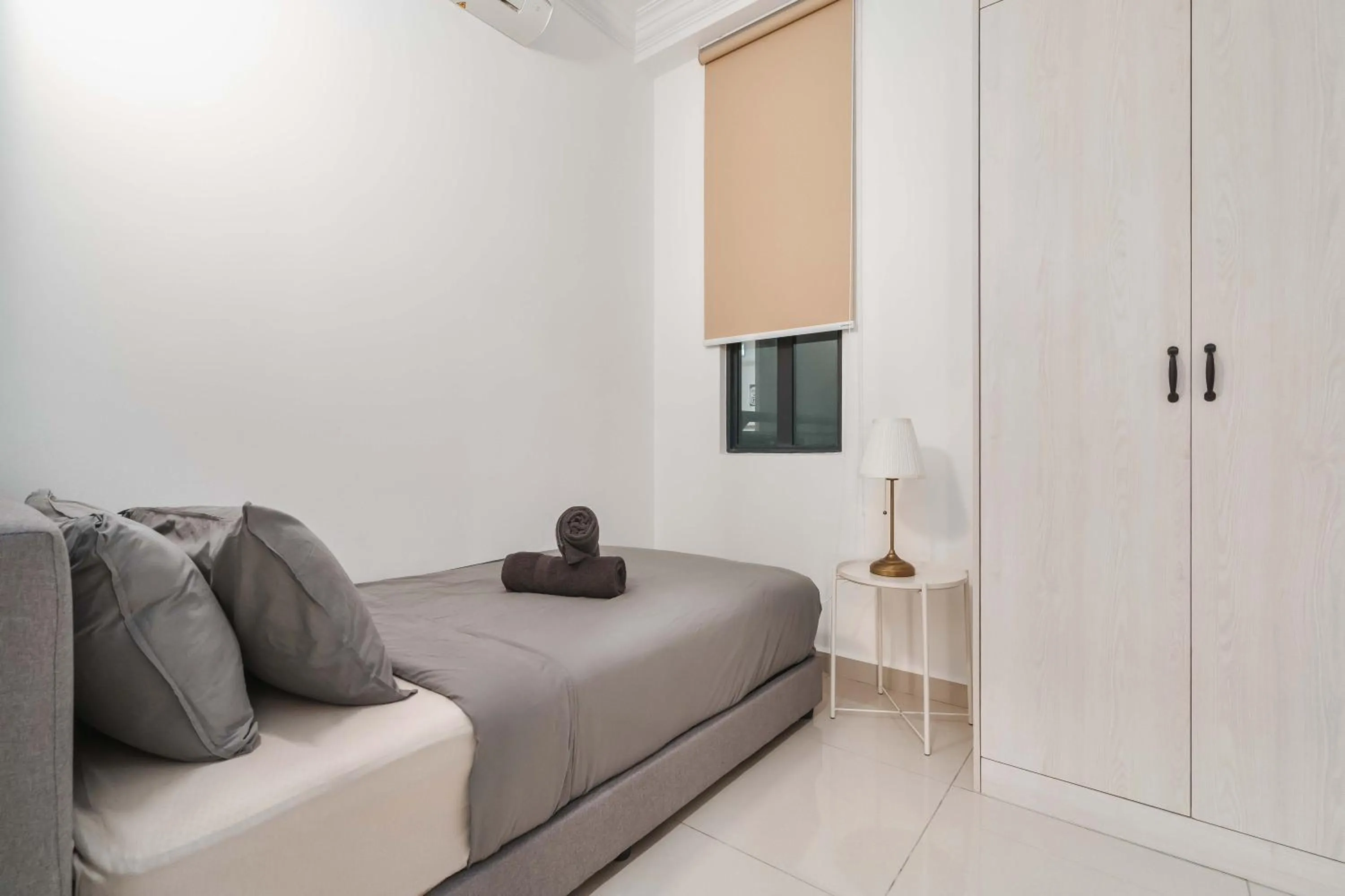 Bed in Legasi Kampung Baru Guesthouse