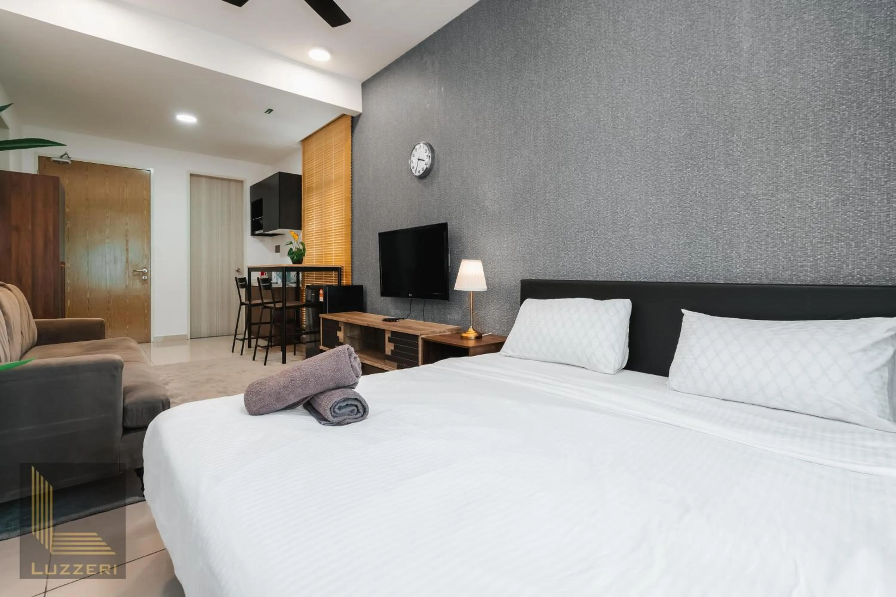 Living room, Bed in Legasi Kampung Baru Guesthouse