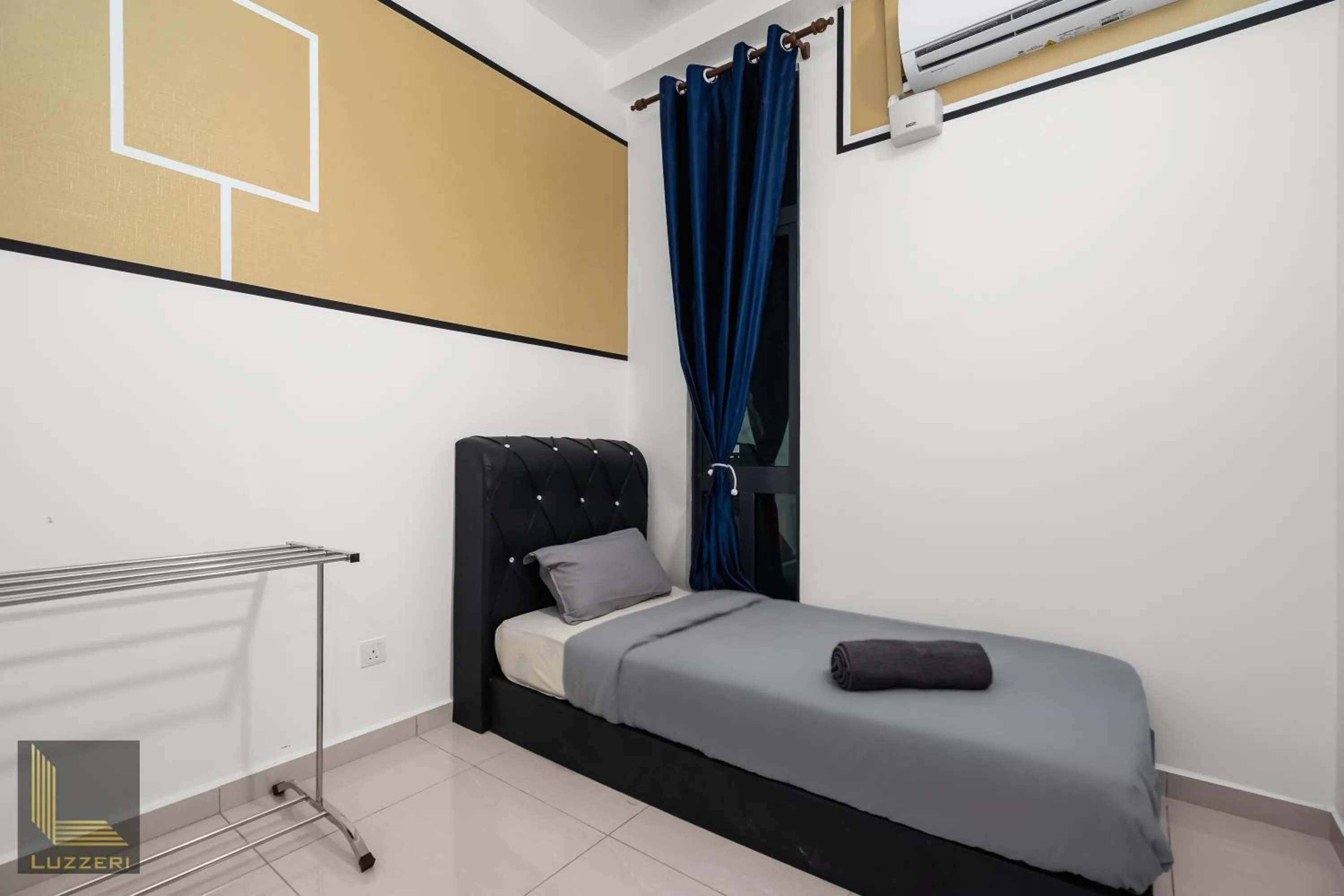 Bed in Legasi Kampung Baru Guesthouse