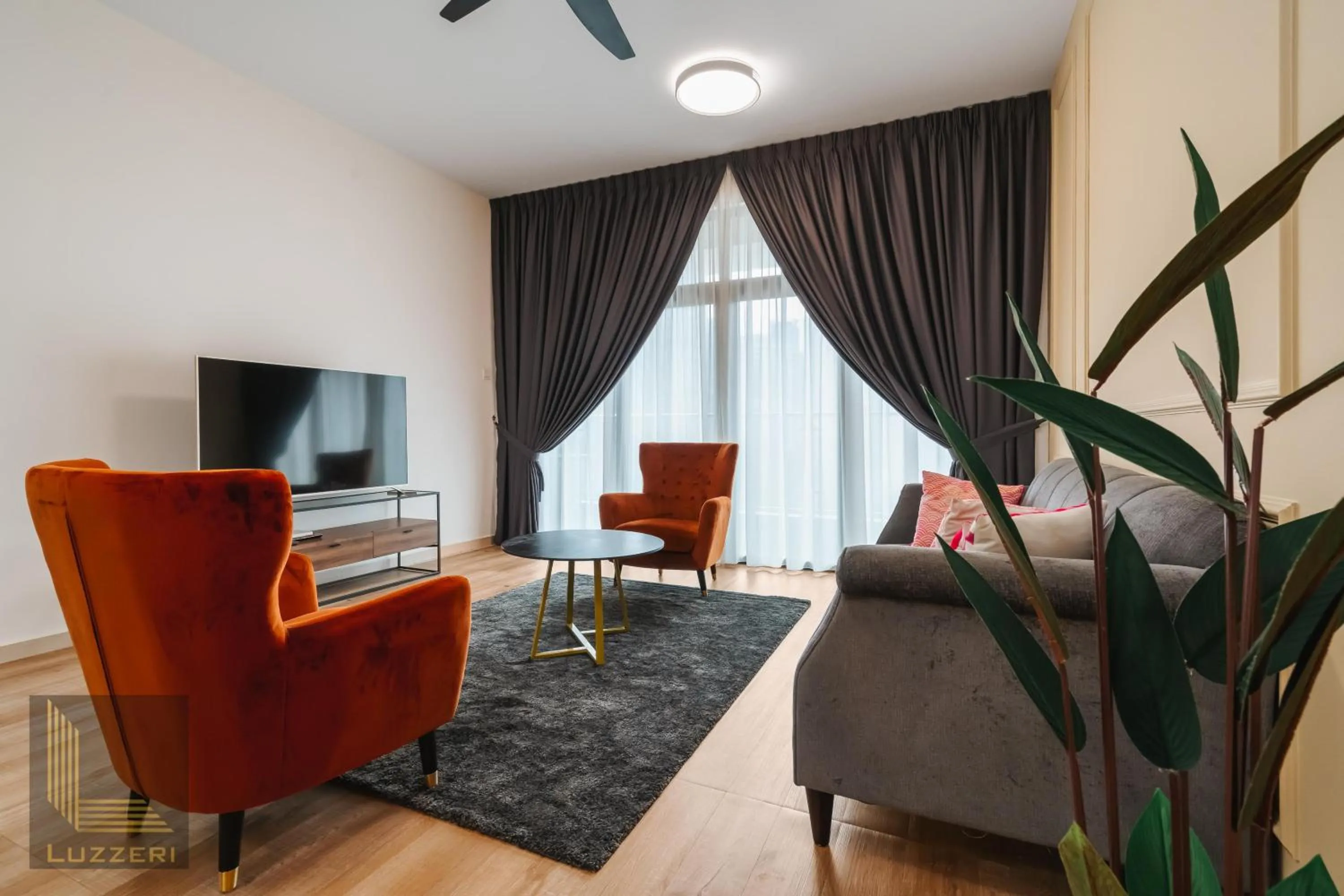 Living room in Legasi Kampung Baru Guesthouse