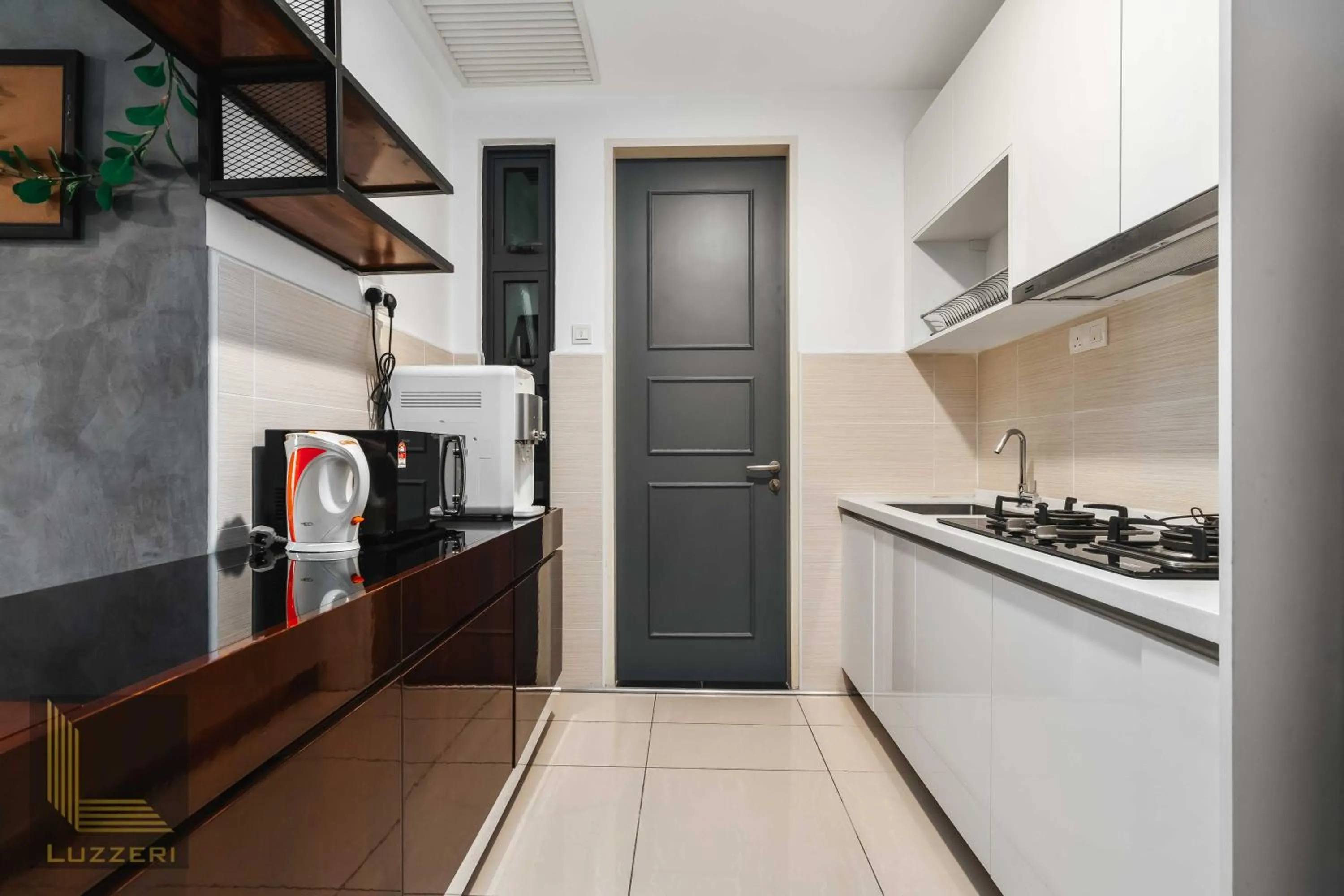 kitchen in Legasi Kampung Baru Guesthouse