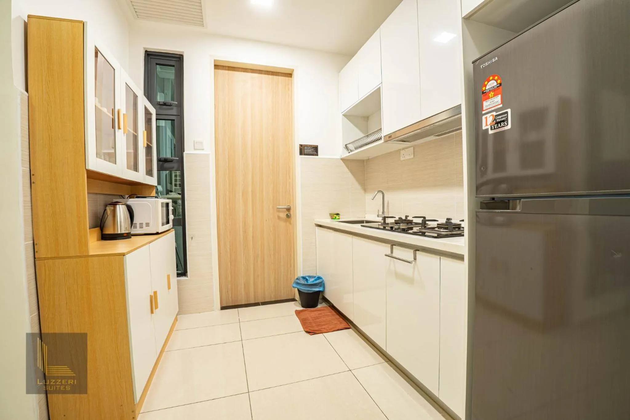 kitchen in Legasi Kampung Baru Guesthouse