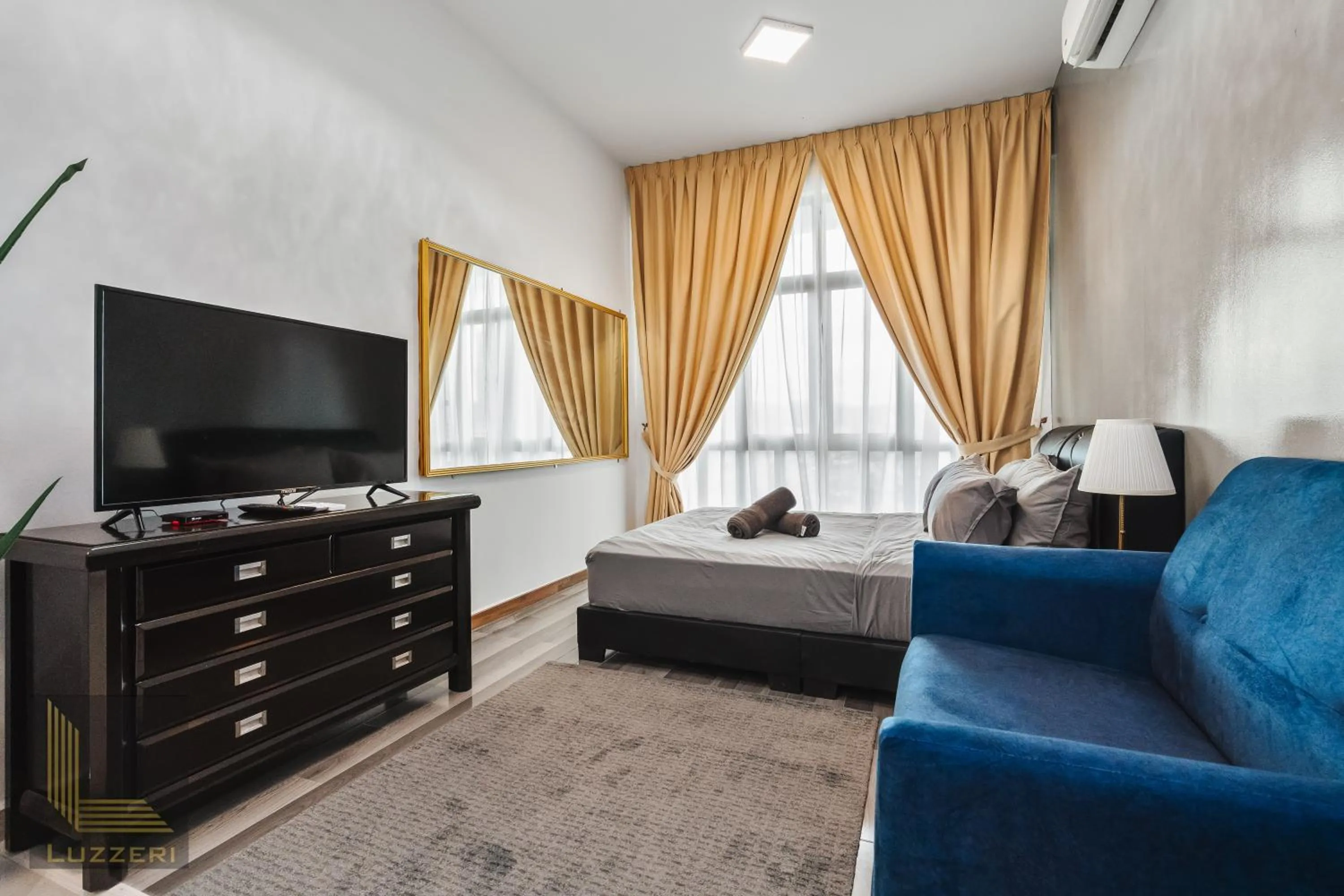 Bed in Legasi Kampung Baru Guesthouse