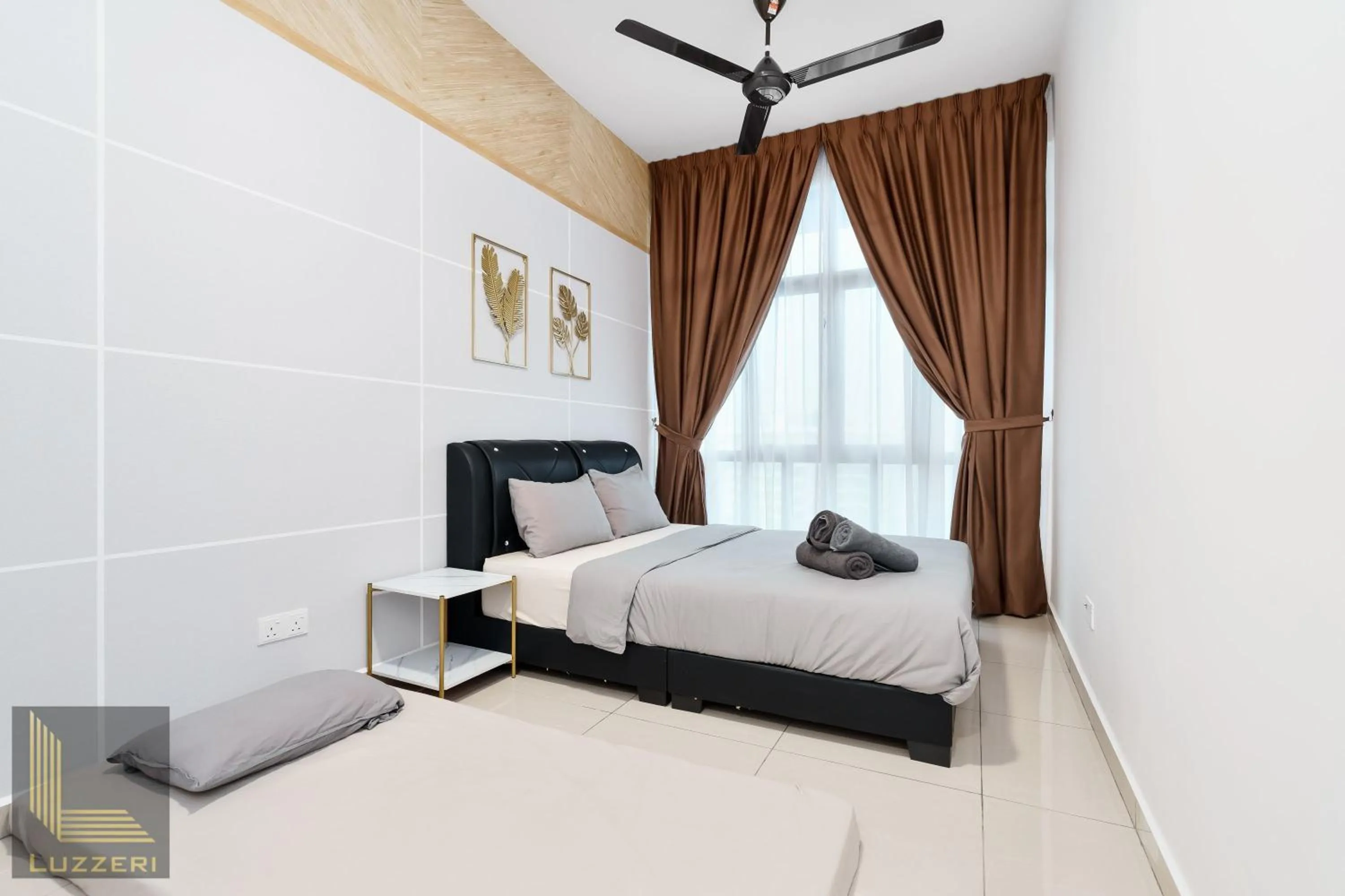 Bed in Legasi Kampung Baru Guesthouse