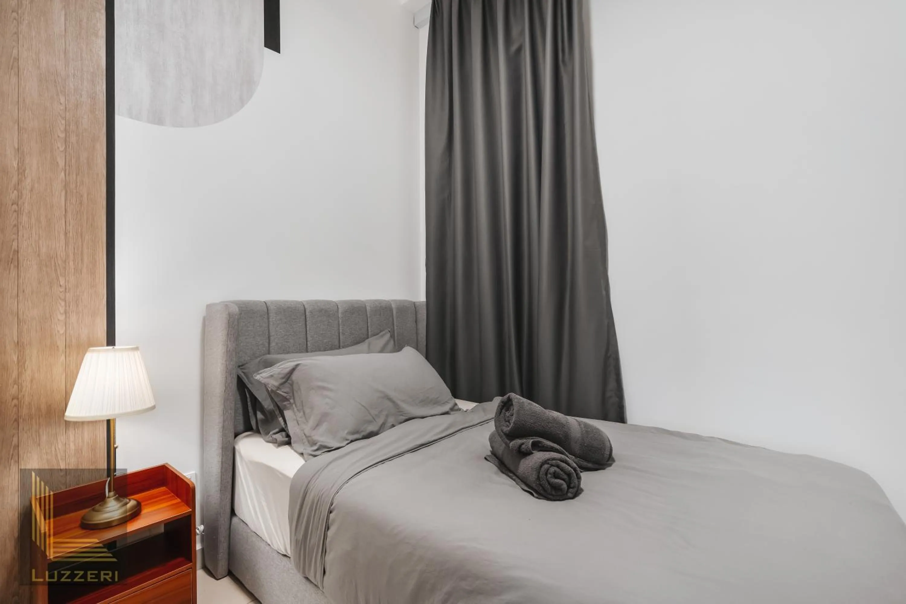 Bed in Legasi Kampung Baru Guesthouse