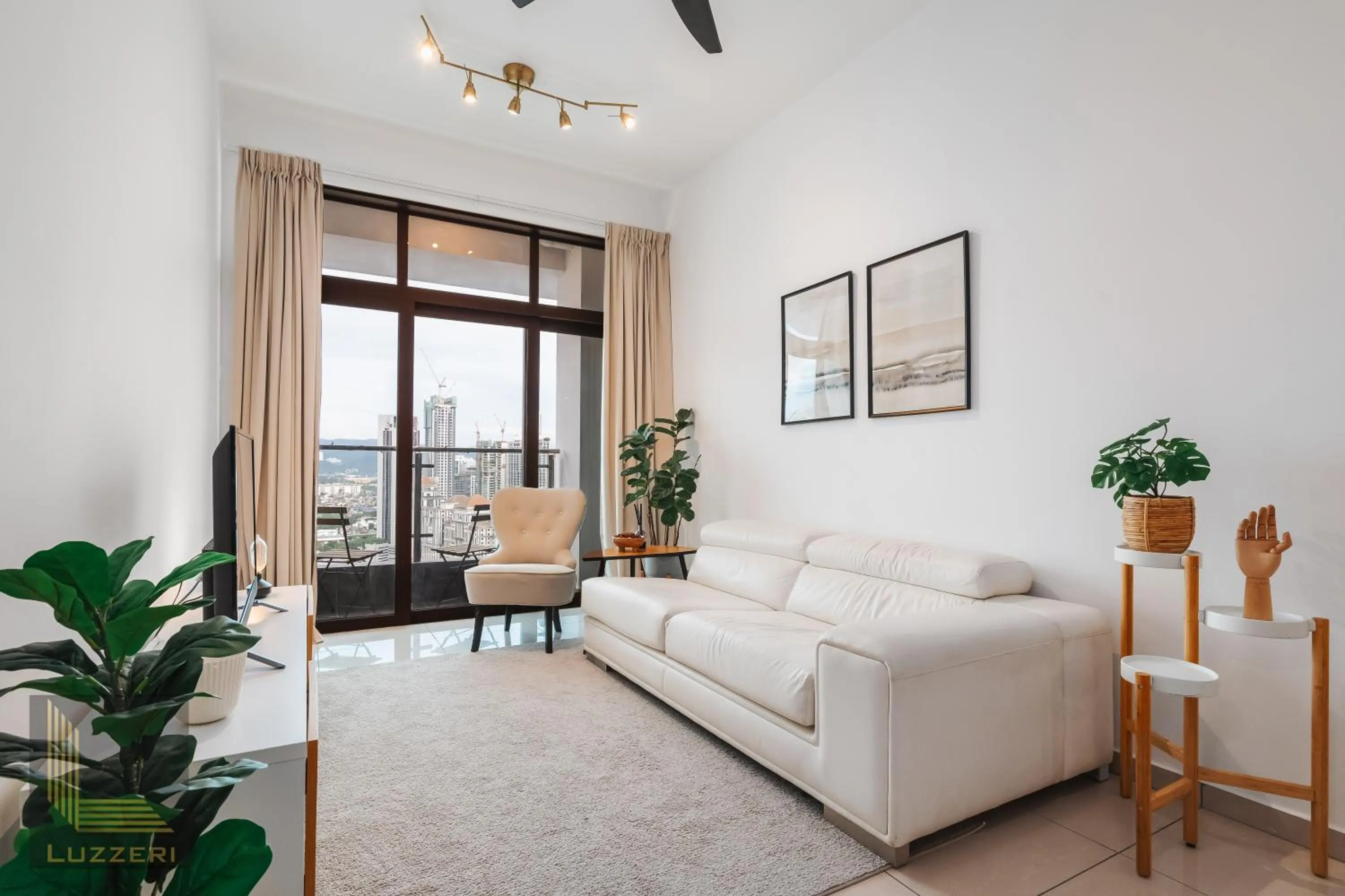 Living room in Legasi Kampung Baru Guesthouse