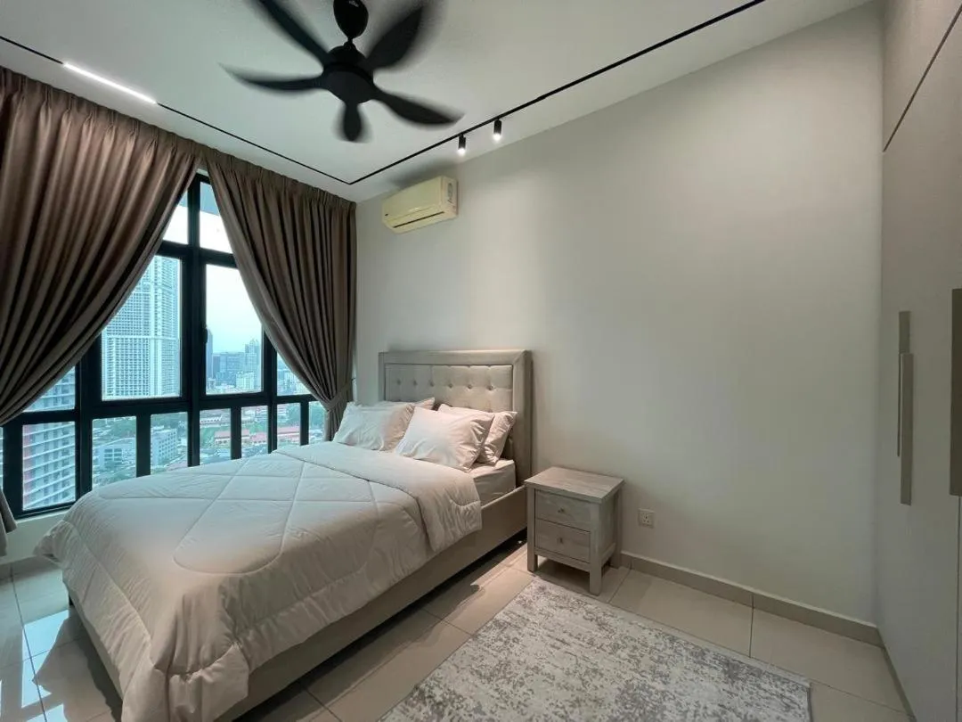 Bed in Legasi Kampung Baru Guesthouse