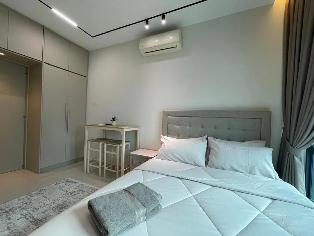 Bed in Legasi Kampung Baru Guesthouse