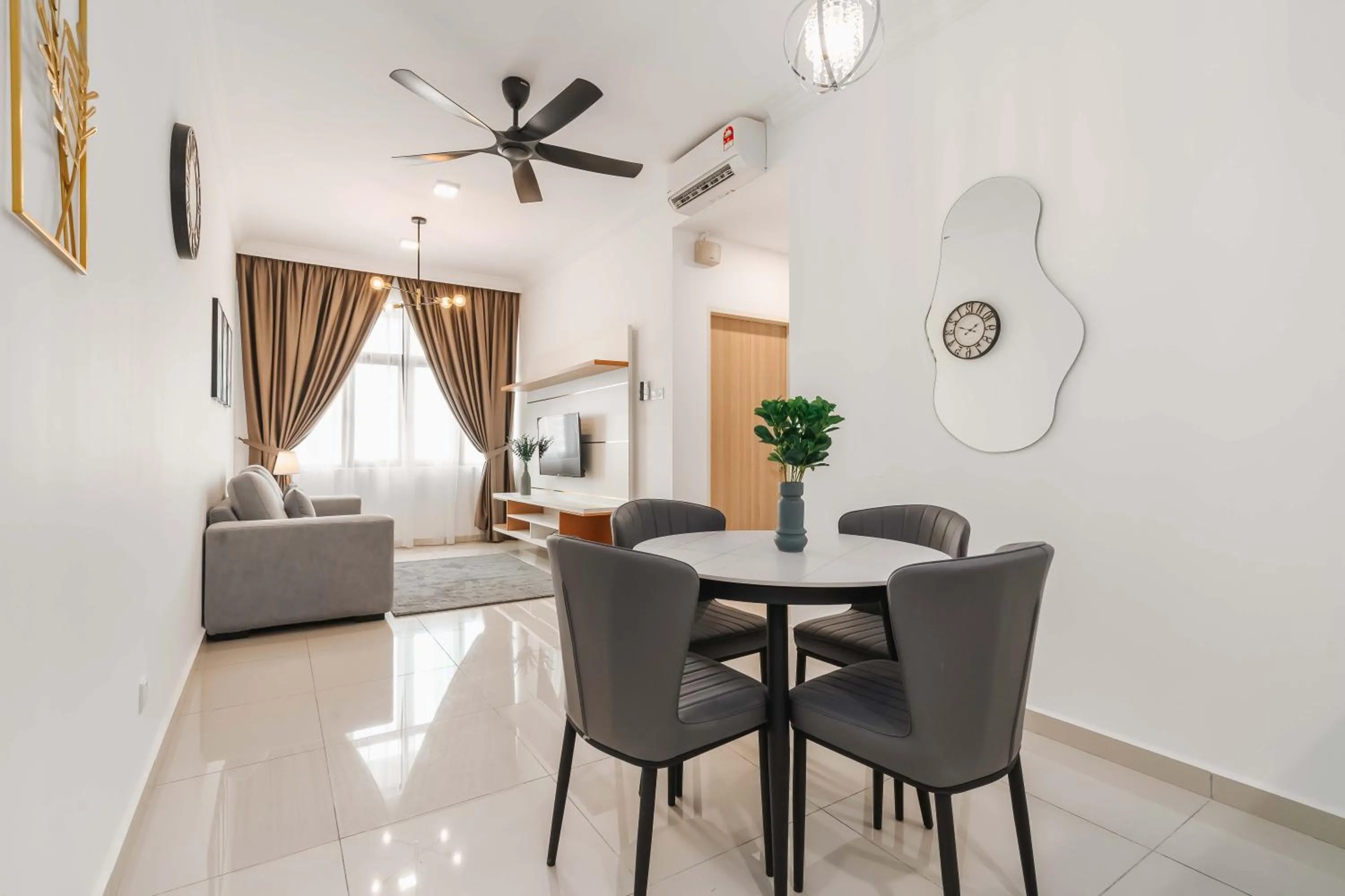 Living room in Legasi Kampung Baru Guesthouse
