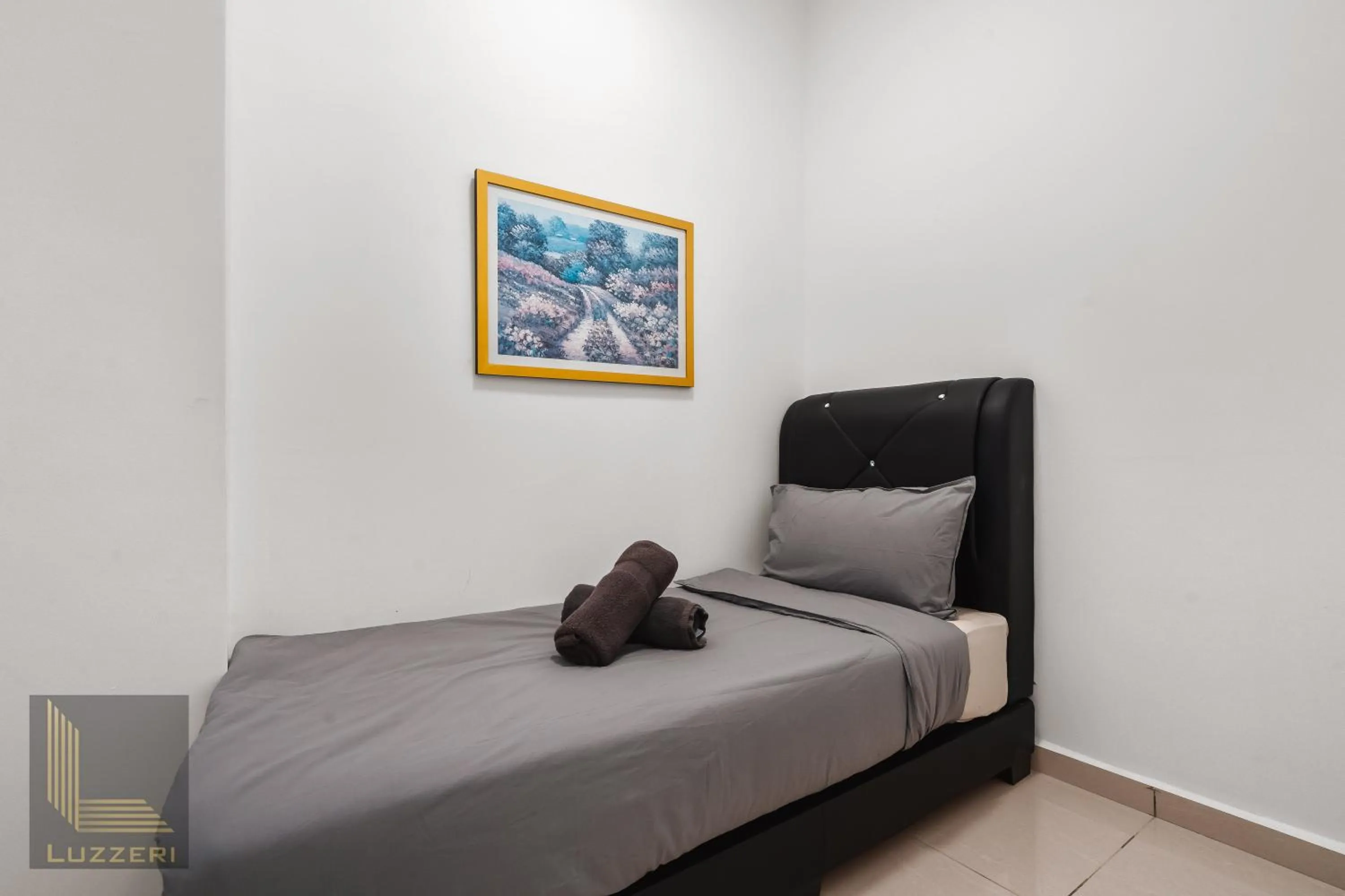 Bed in Legasi Kampung Baru Guesthouse