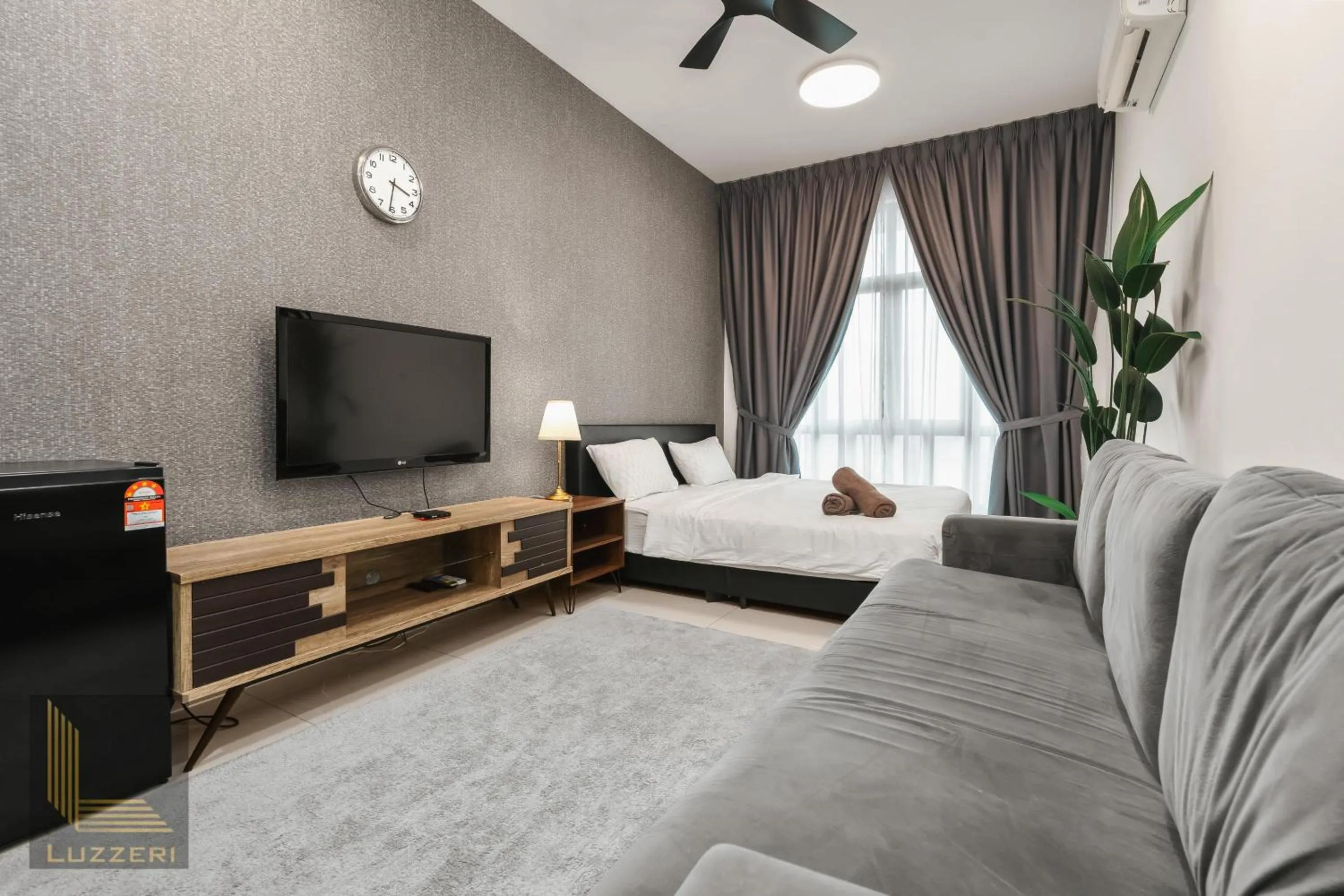 Living room in Legasi Kampung Baru Guesthouse