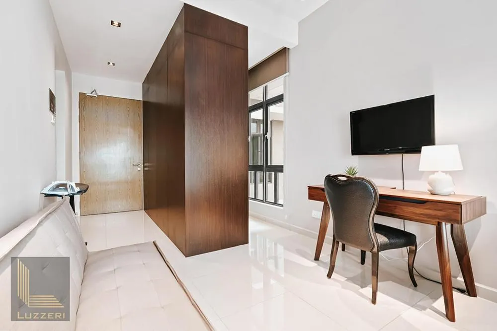 Bed in Legasi Kampung Baru Guesthouse