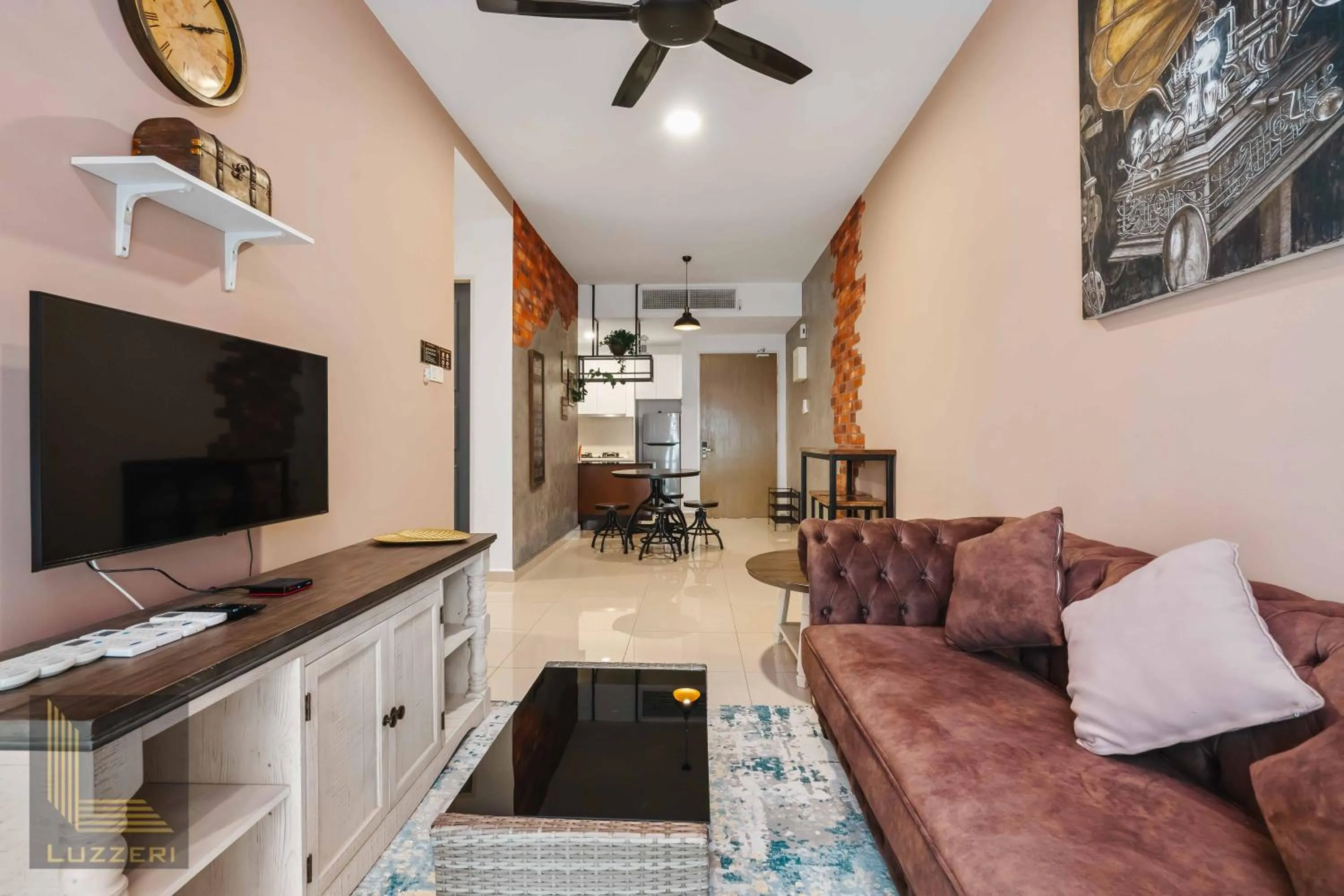 Living room in Legasi Kampung Baru Guesthouse