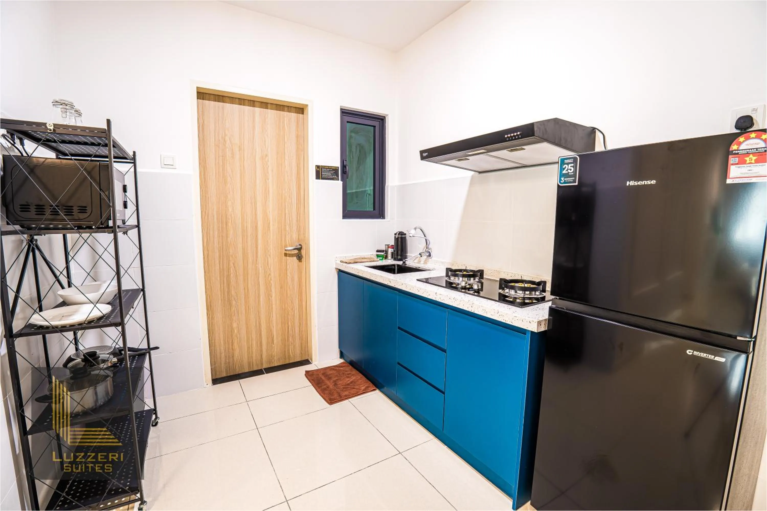 kitchen in Legasi Kampung Baru Guesthouse