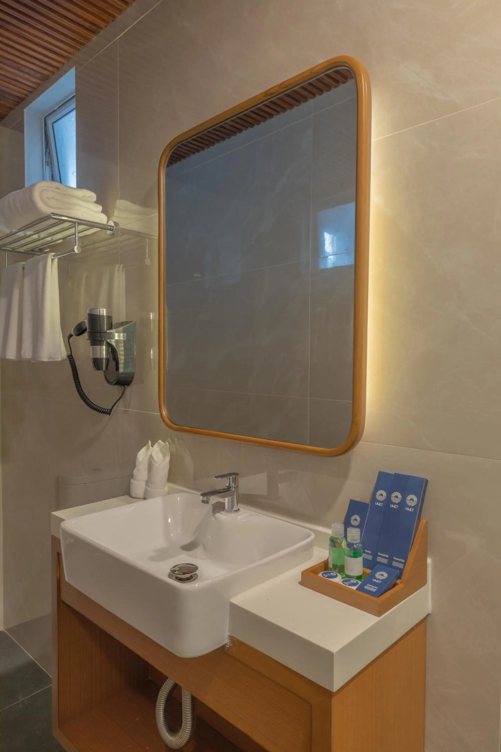 Bathroom in UMET Seaview Hotel with Free Airport Pick up and Drop T&C Apply