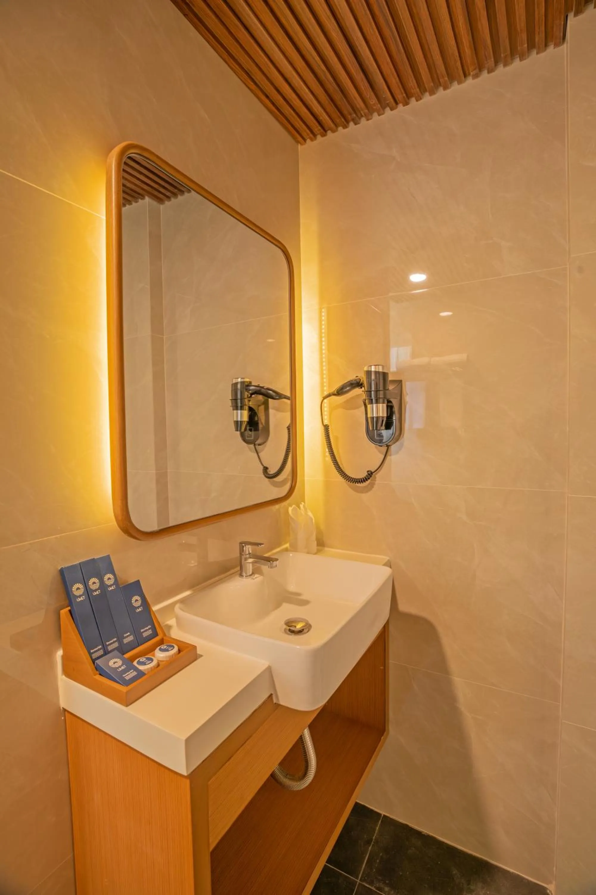 Bathroom in UMET Seaview Hotel with Free Airport Pick up and Drop T&C Apply