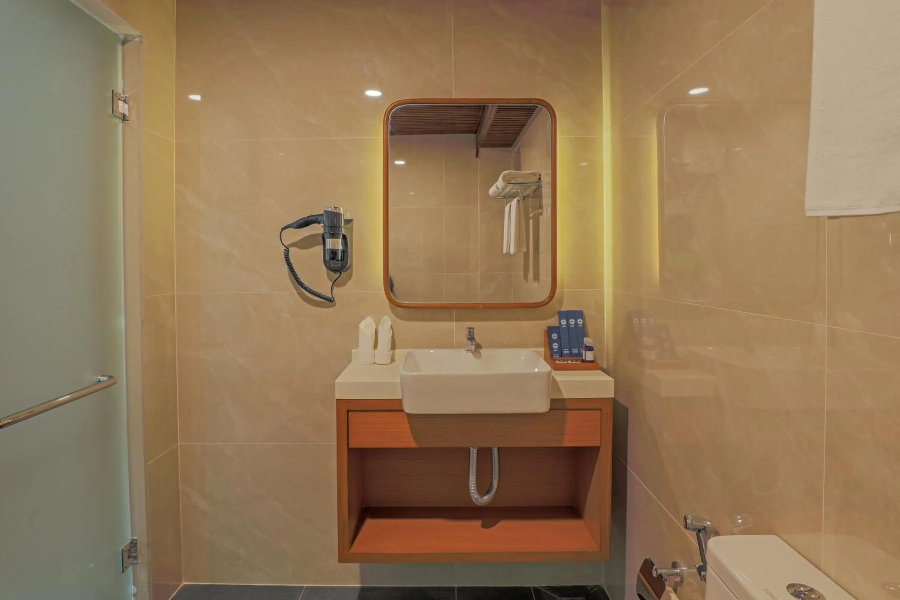 Bathroom in UMET Seaview Hotel with Free Airport Pick up and Drop T&C Apply