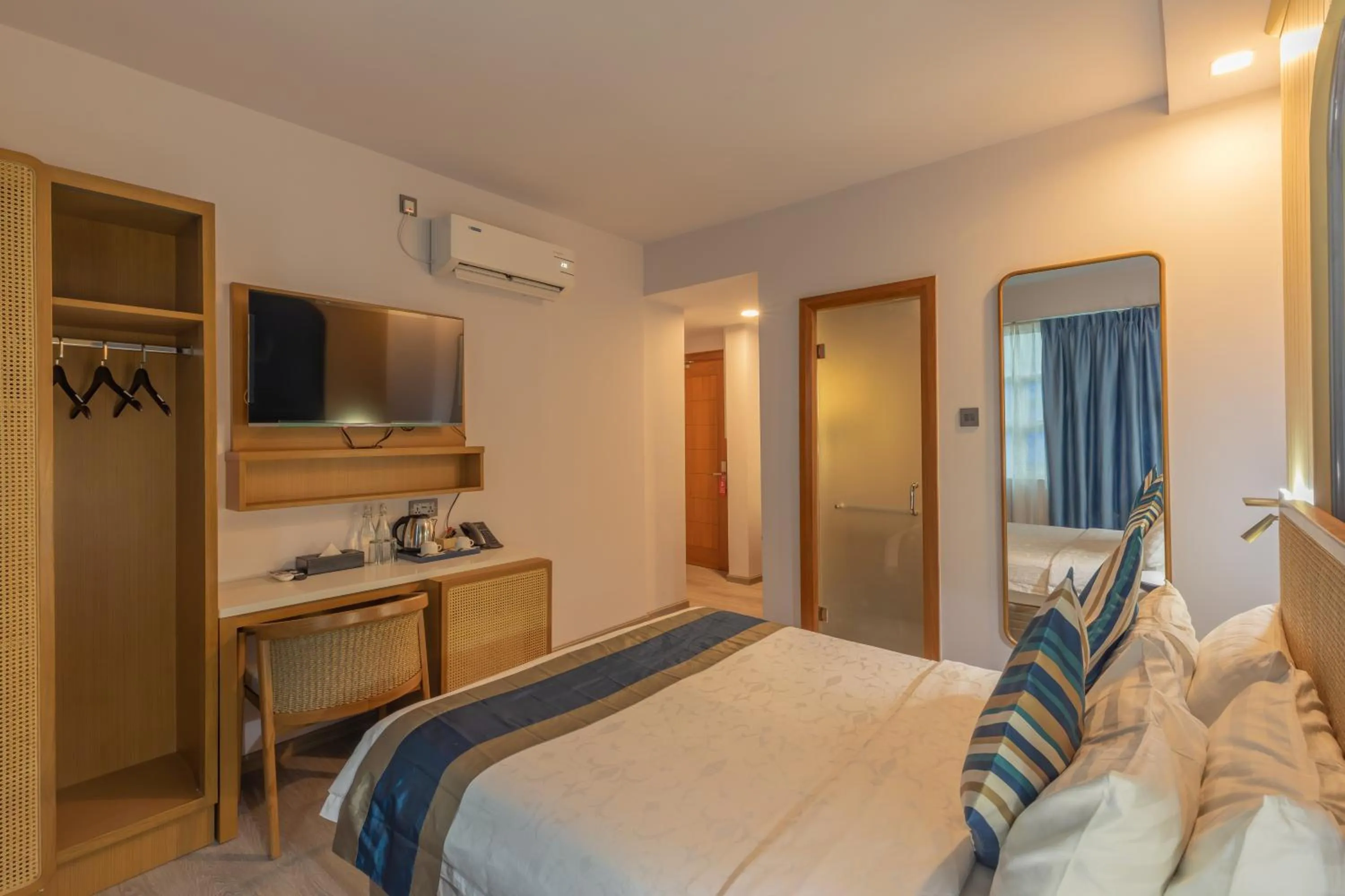 TV and multimedia, Bed in UMET Seaview Hotel with Free Airport Pick up and Drop T&C Apply
