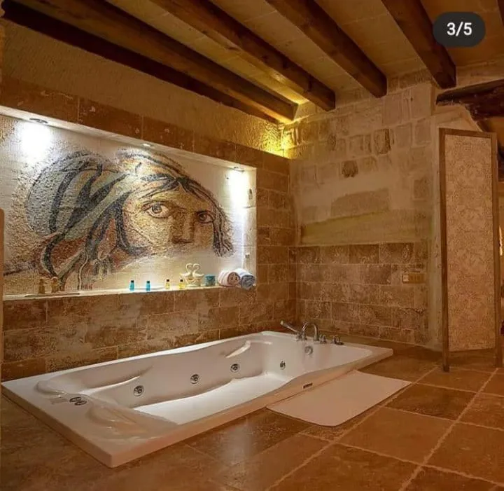 Bath in Sinasos Palace Cave Hotel