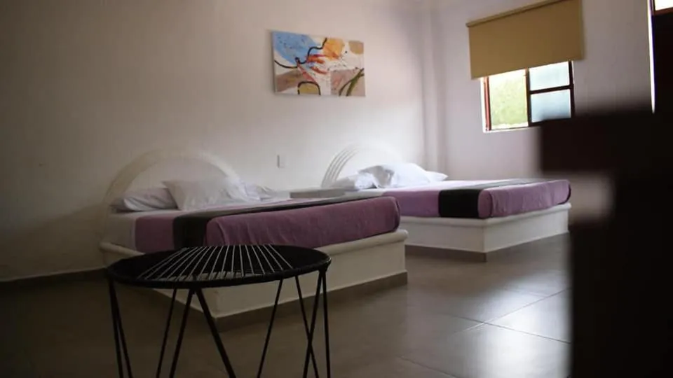 Bed in Hotel San Carlos Yautepec