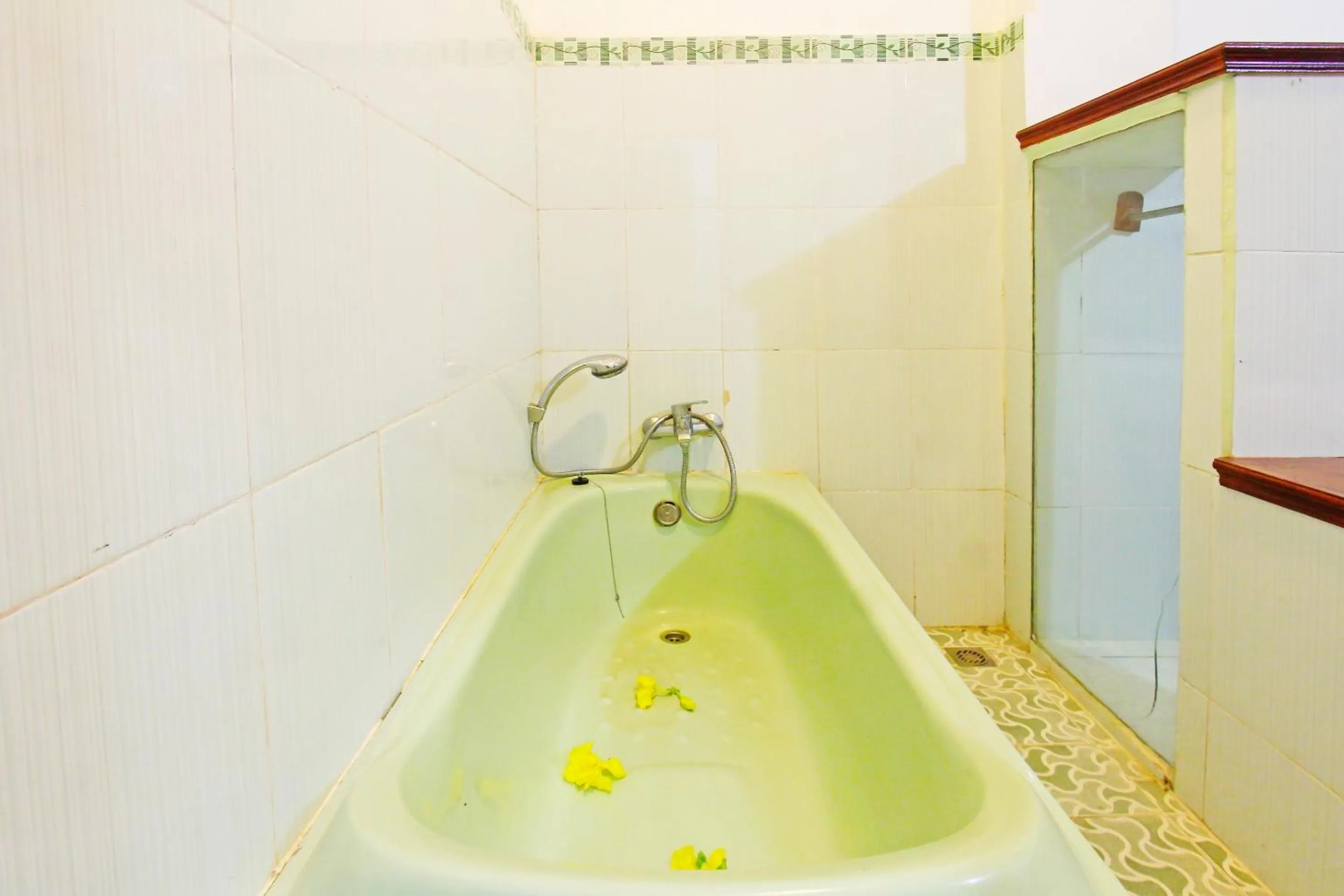 Bathroom in OYO 91564 Ayodya Guest House