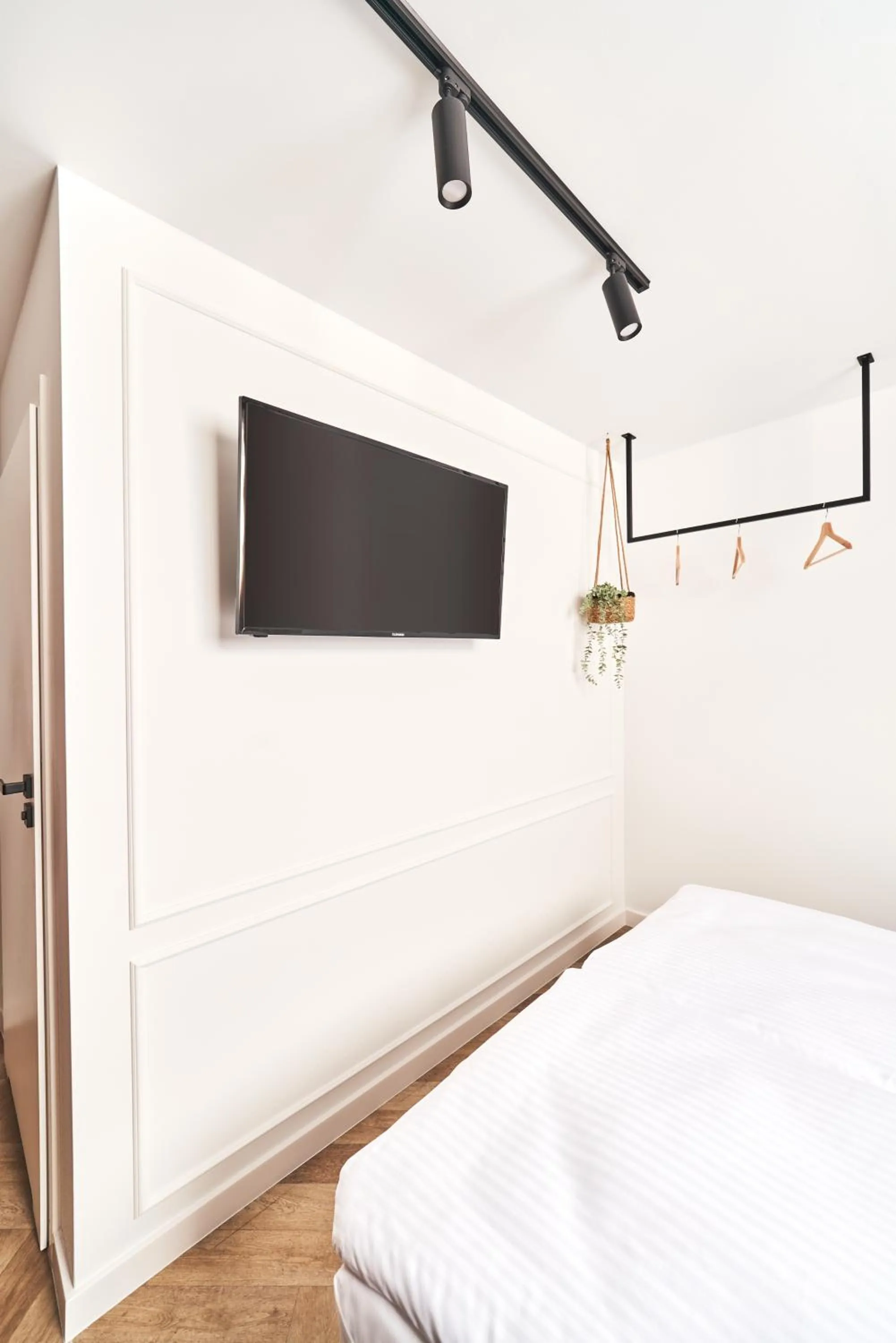 Communal lounge/ TV room, Bed in Na Fursie Apartments & Rooms