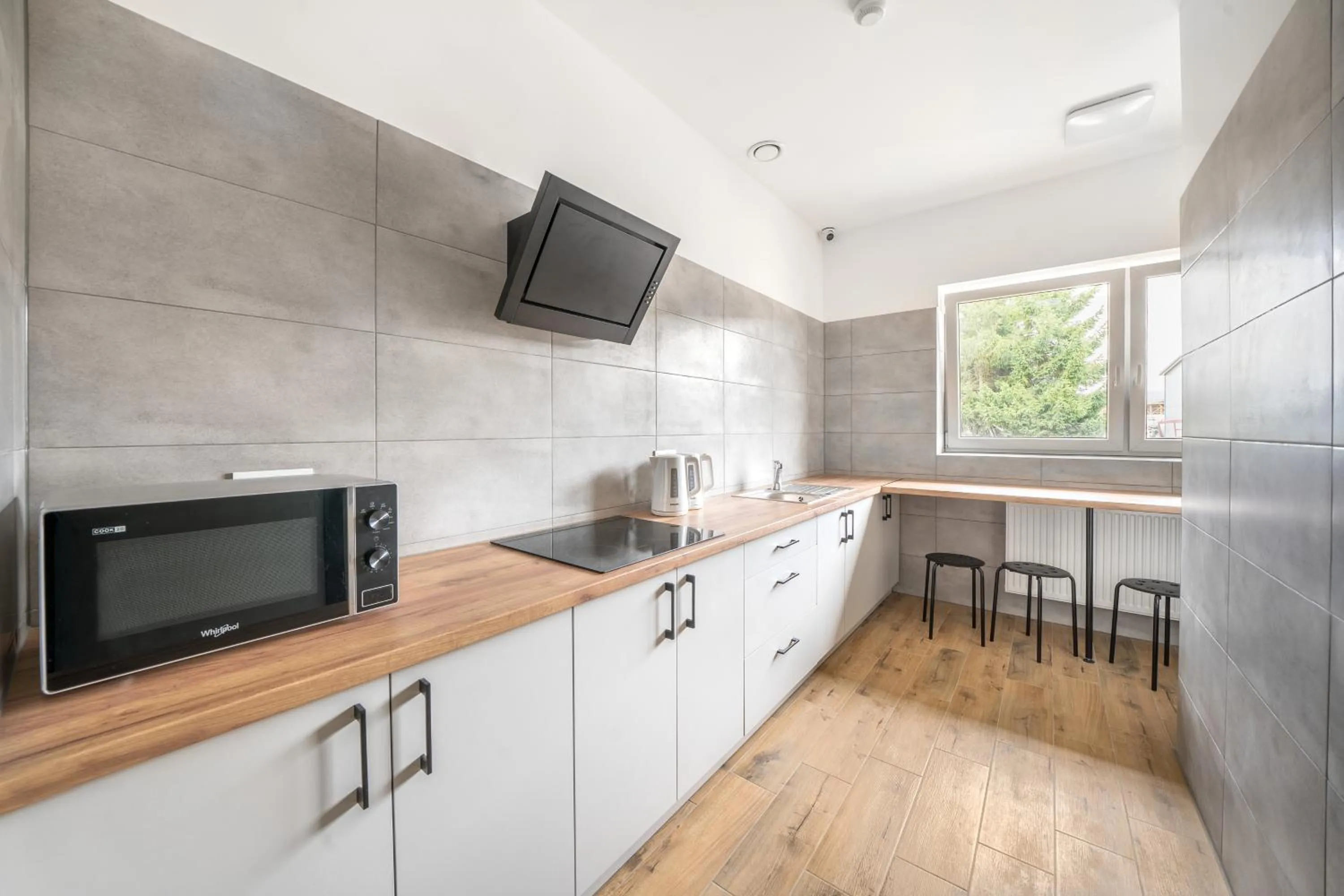 Kitchen or kitchenette in Na Fursie Apartments & Rooms