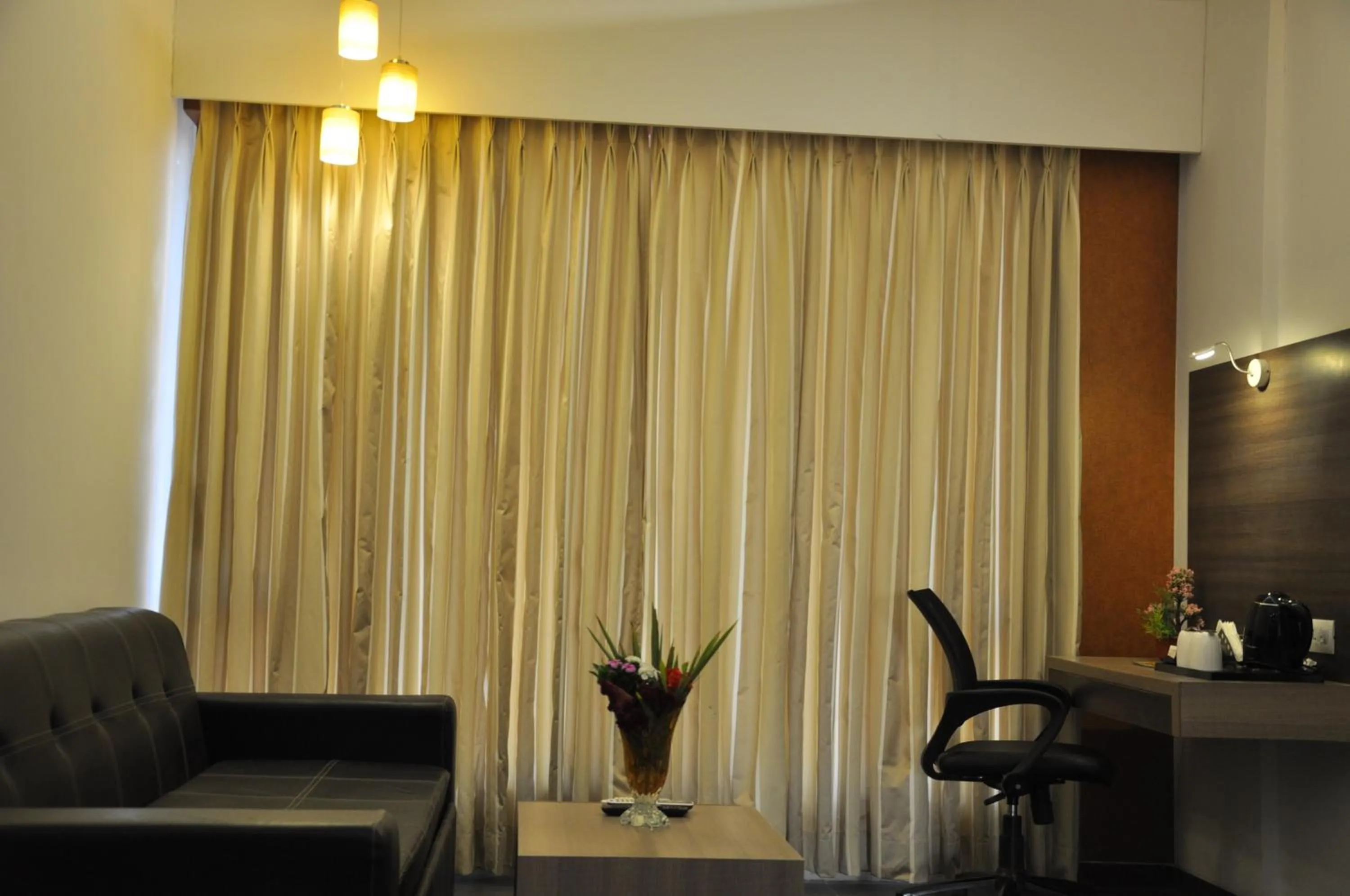 Living room in Pride Biznotel Manjusar Vadodara Near Sokhda Lake