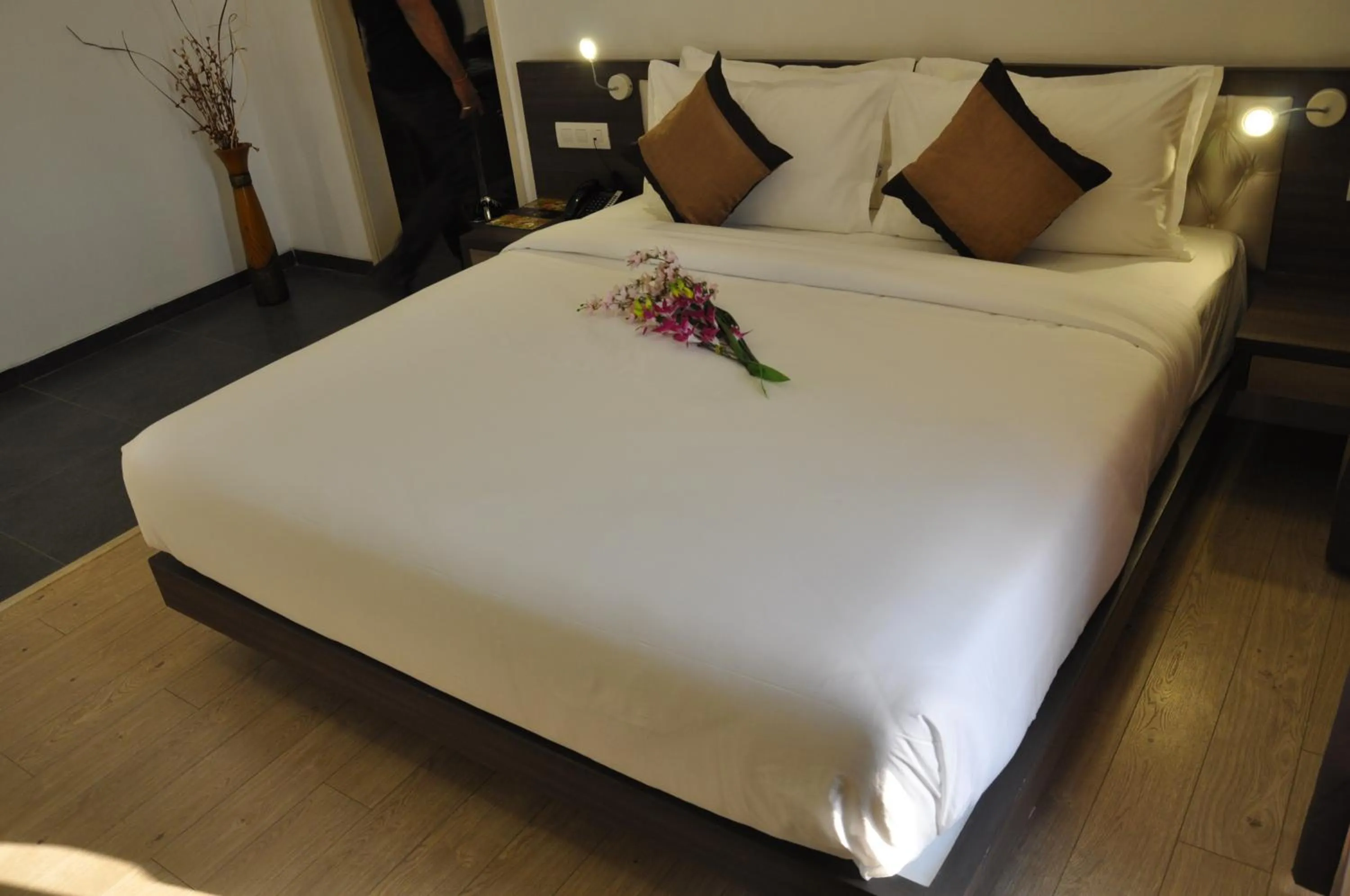 Photo of the whole room, Bed in Pride Biznotel Manjusar Vadodara Near Sokhda Lake