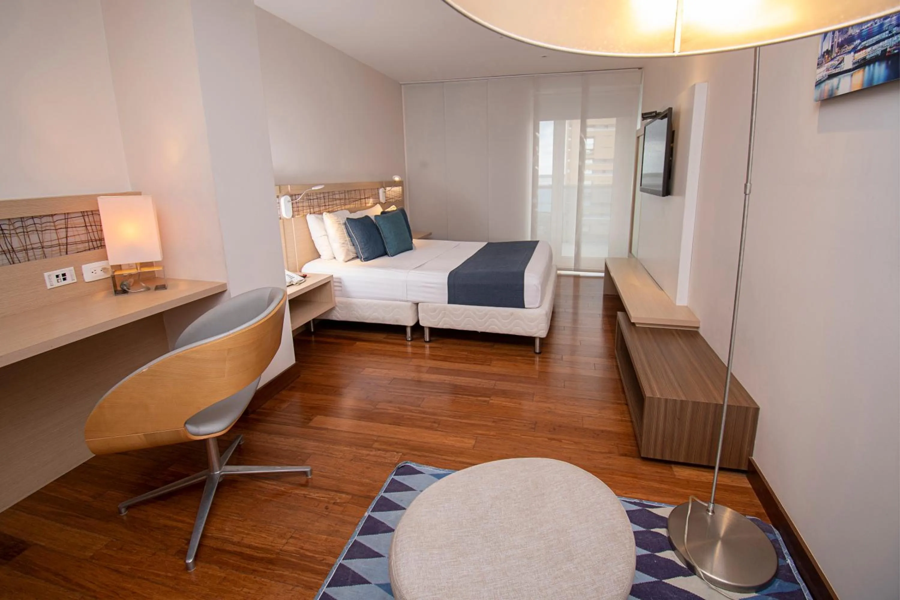 Bed in Cosmos Pacifico Hotel