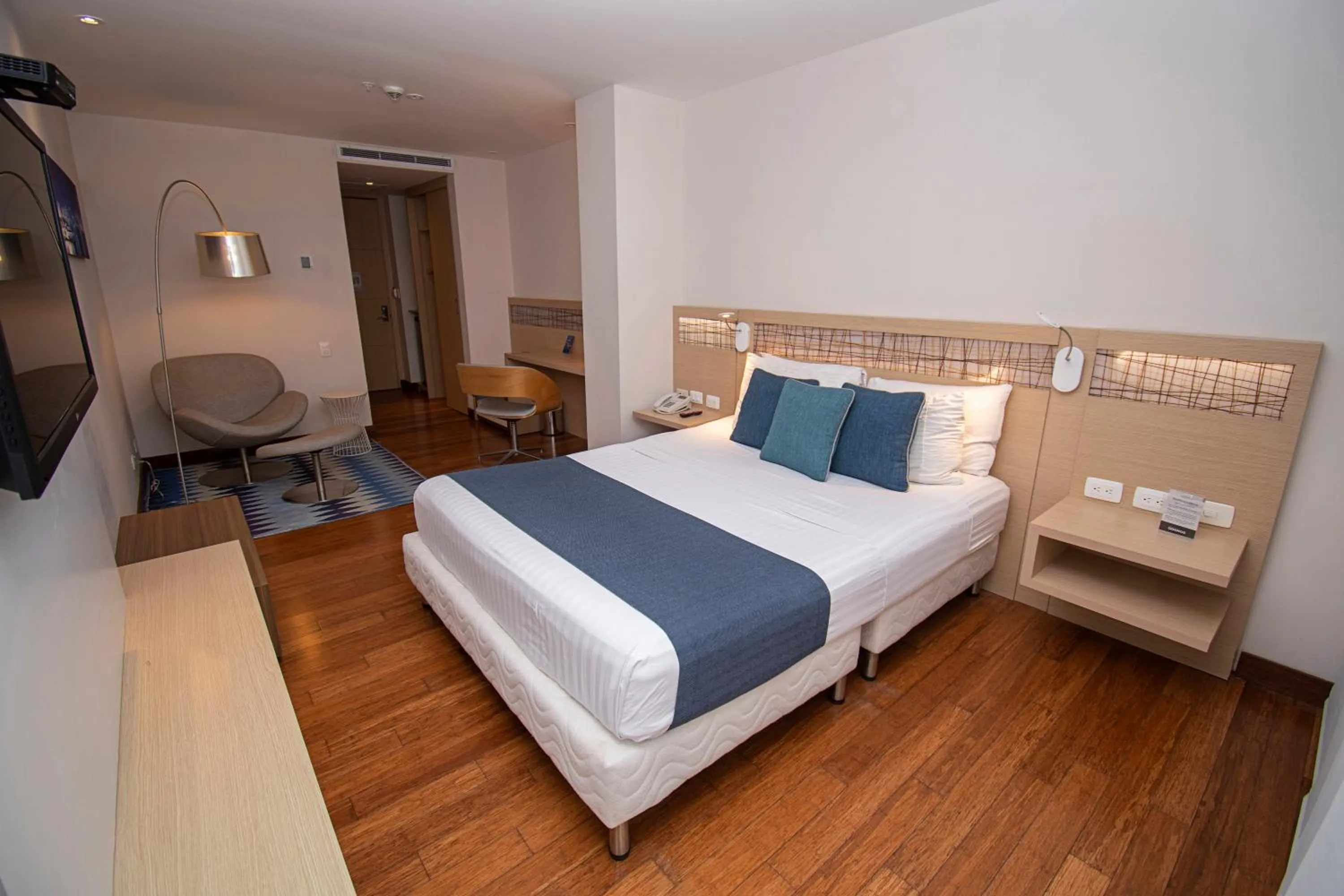 Bed in Cosmos Pacifico Hotel