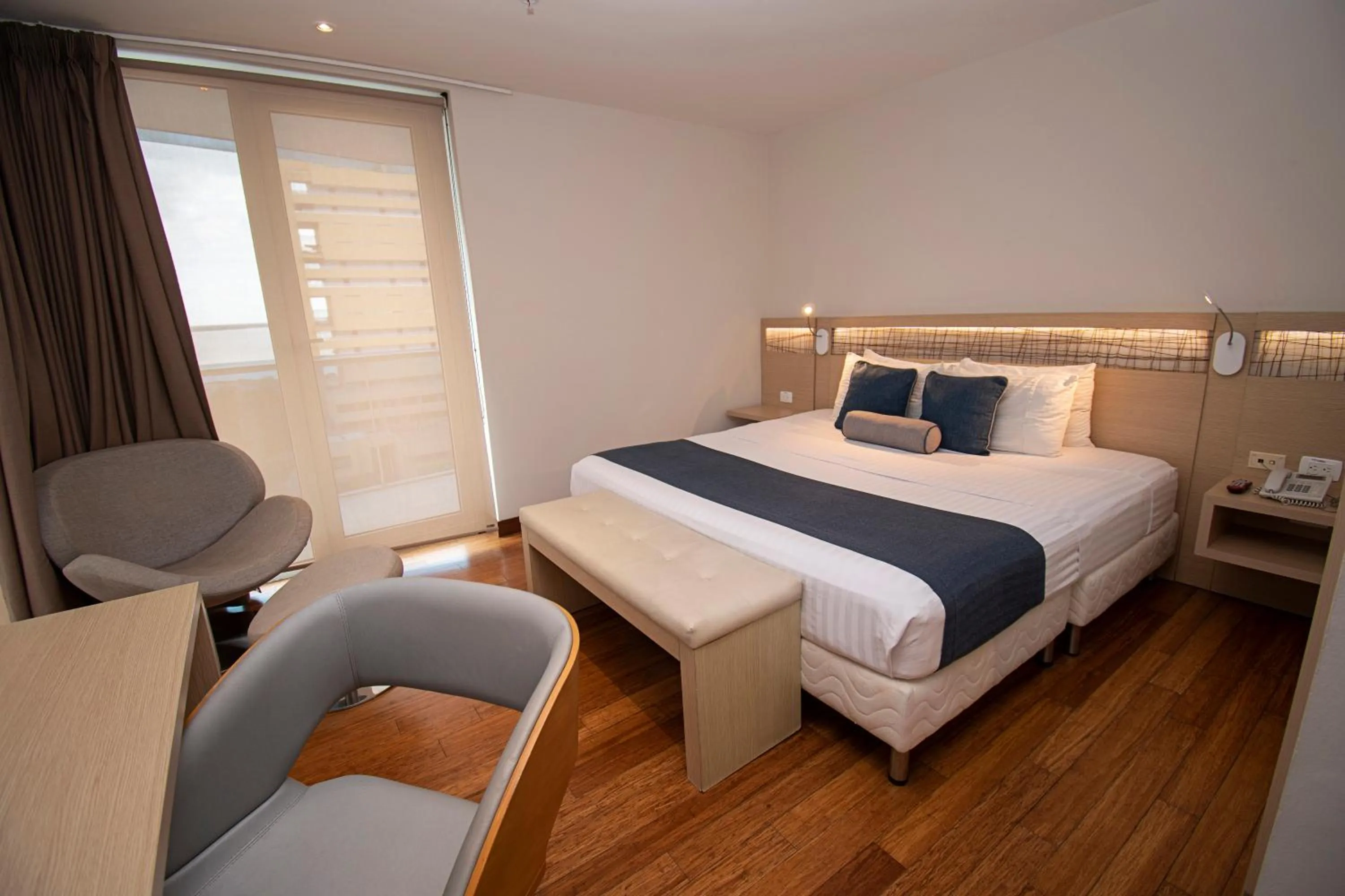 Bed in Cosmos Pacifico Hotel