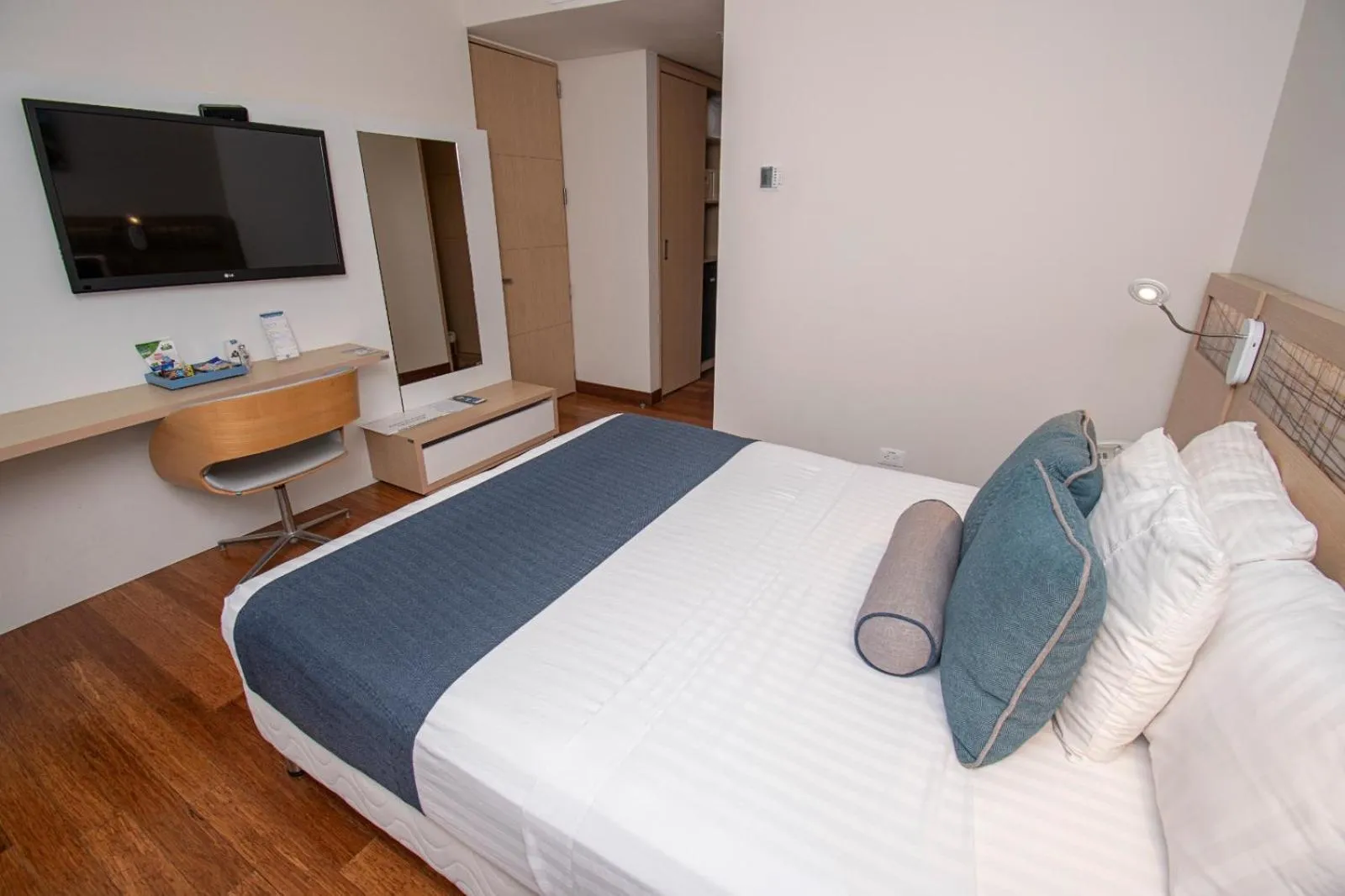 Bed in Cosmos Pacifico Hotel