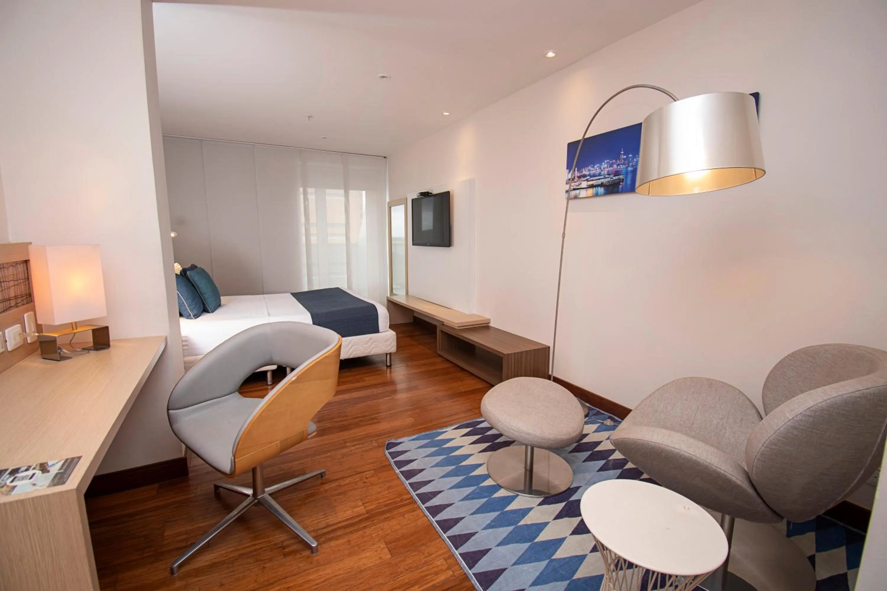 Bed in Cosmos Pacifico Hotel