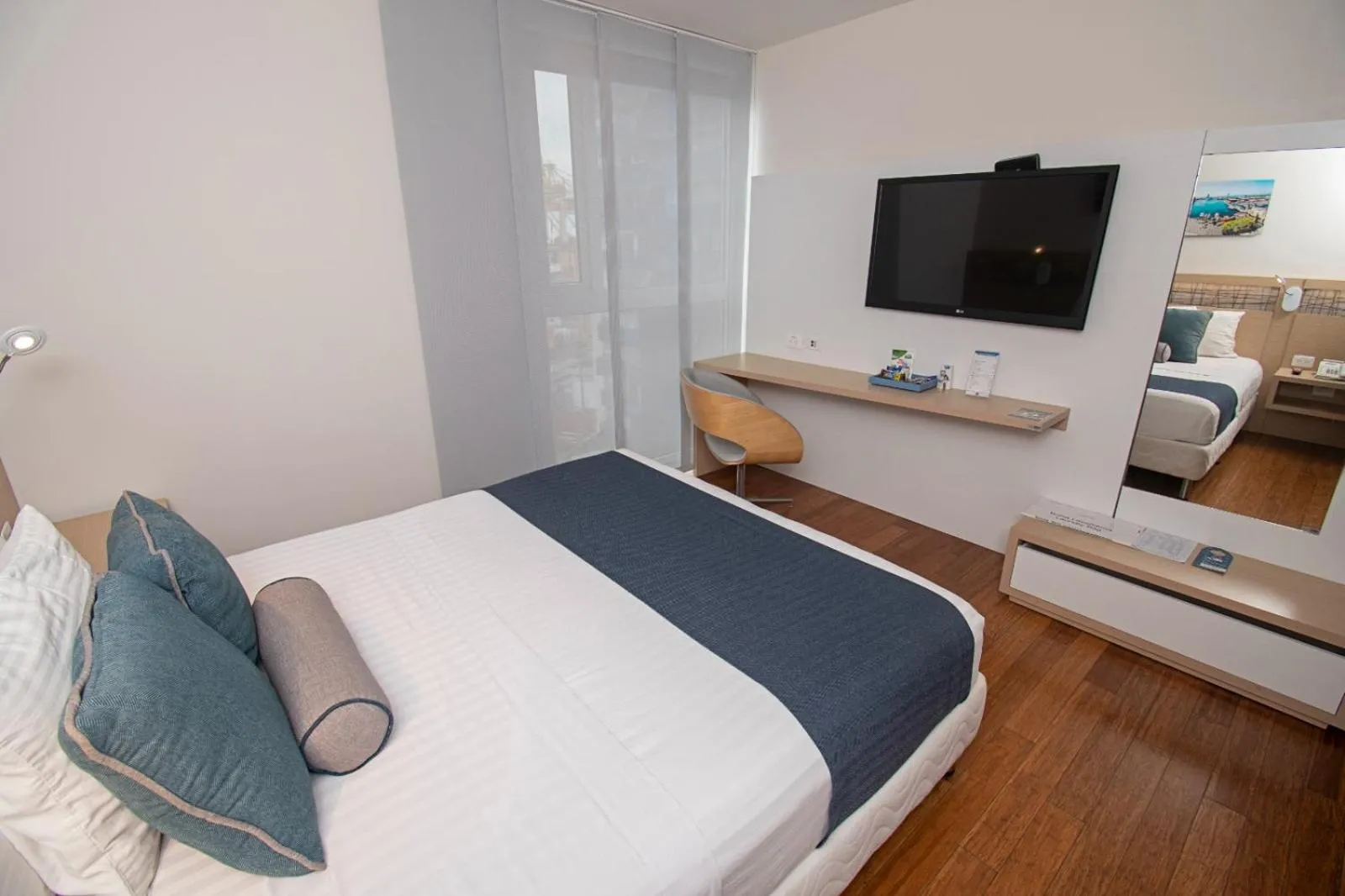 Bed in Cosmos Pacifico Hotel