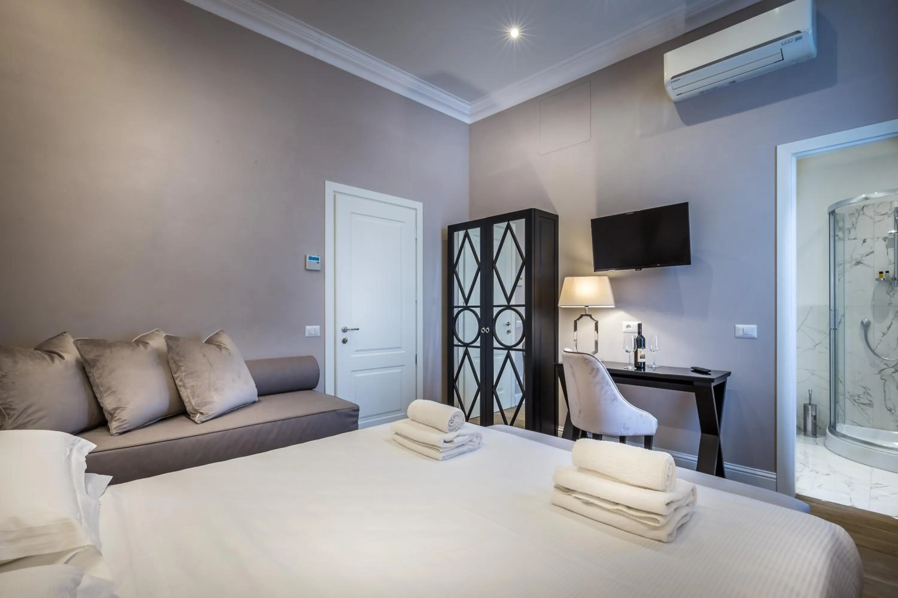 Bed in Hotel Emma Small Luxury Hotel