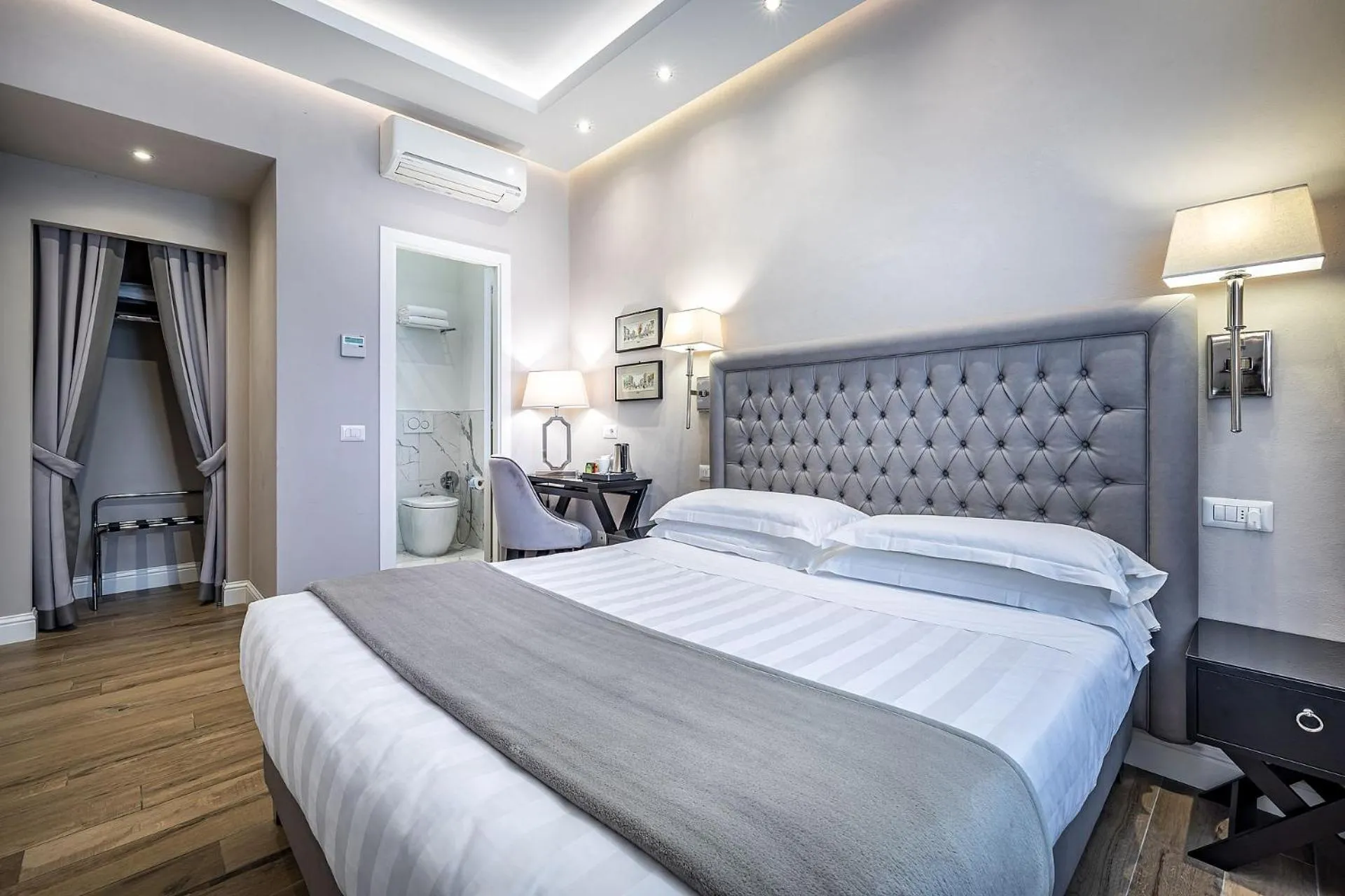 Bed in Hotel Emma Small Luxury Hotel