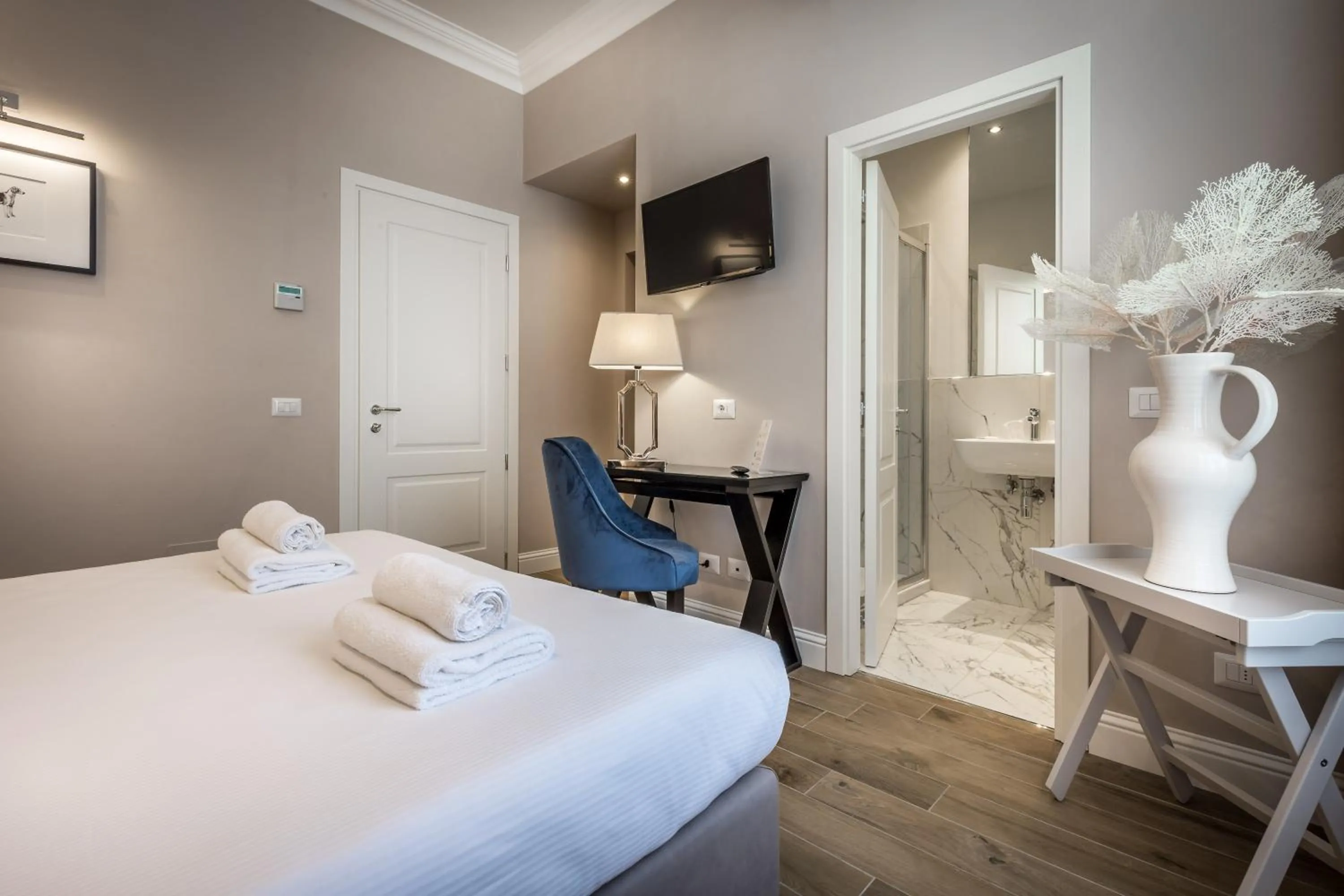 Bed in Hotel Emma Small Luxury Hotel