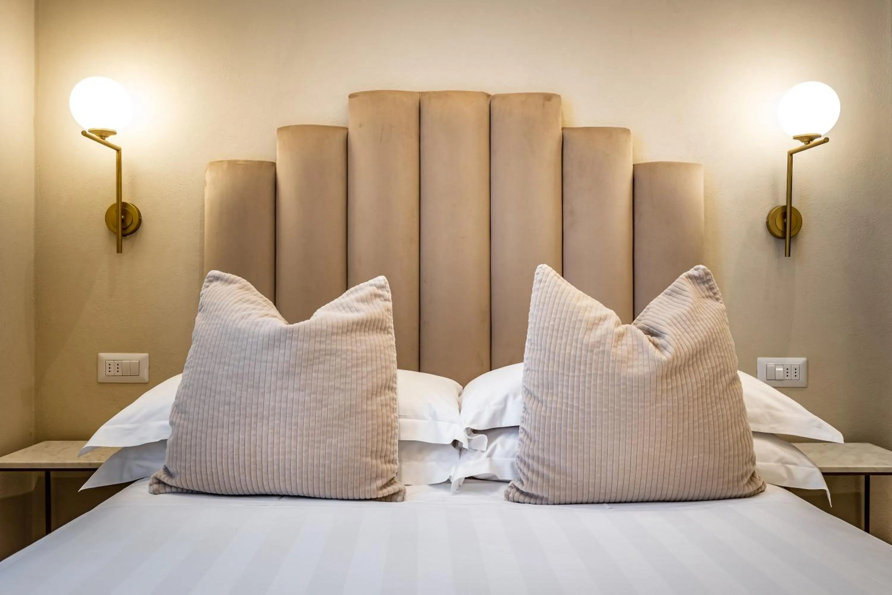 Bed in Hotel Emma Small Luxury Hotel