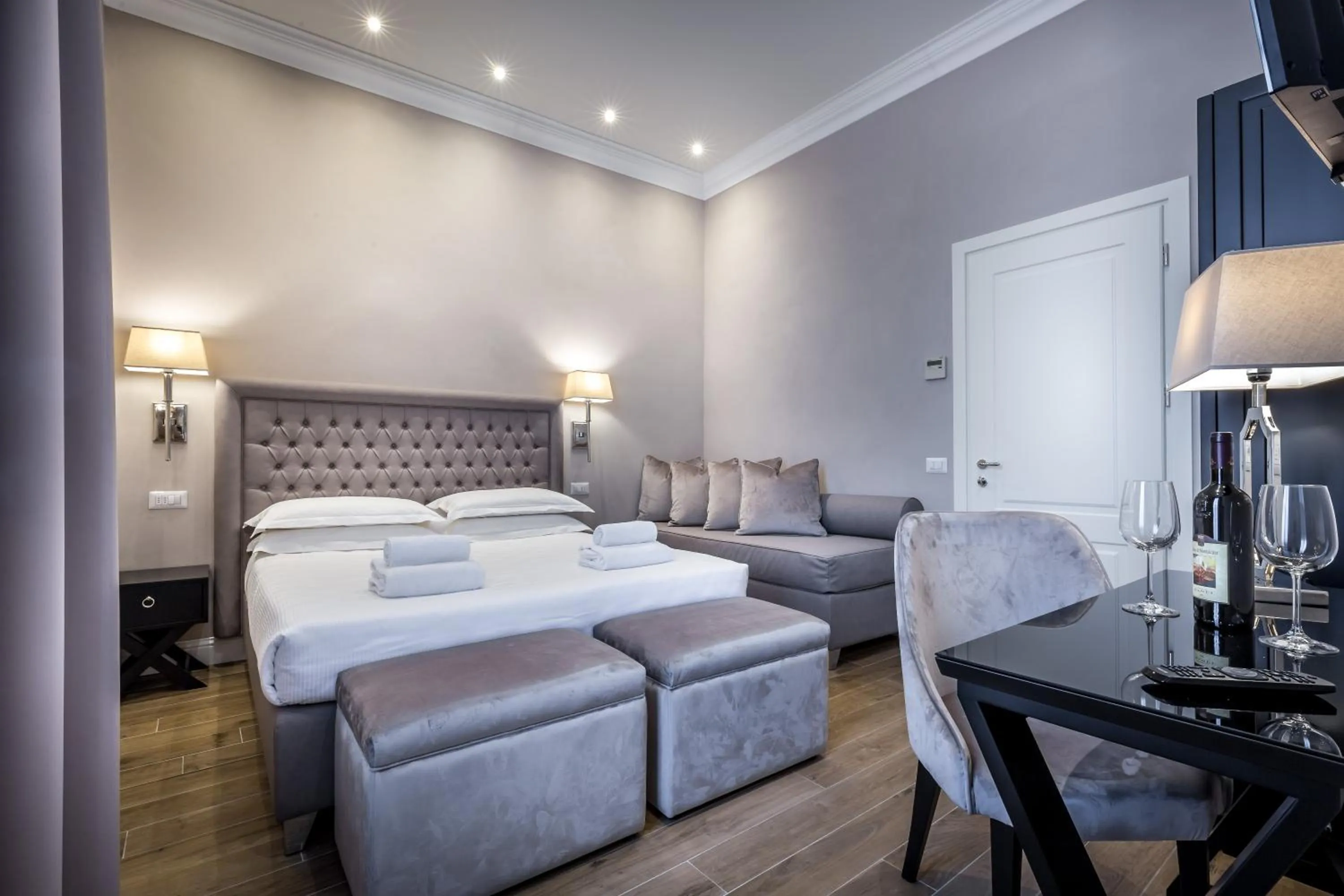 Bed in Hotel Emma Small Luxury Hotel