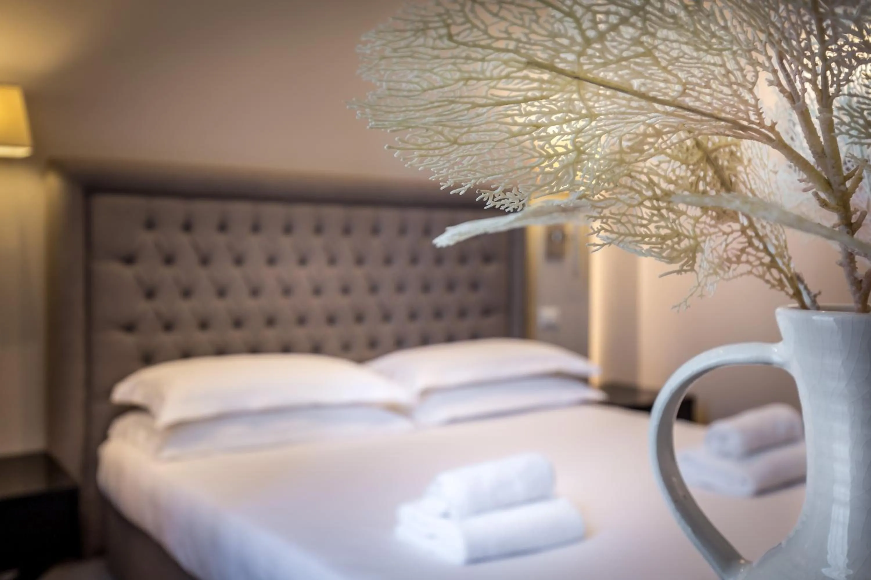 Bed in Hotel Emma Small Luxury Hotel