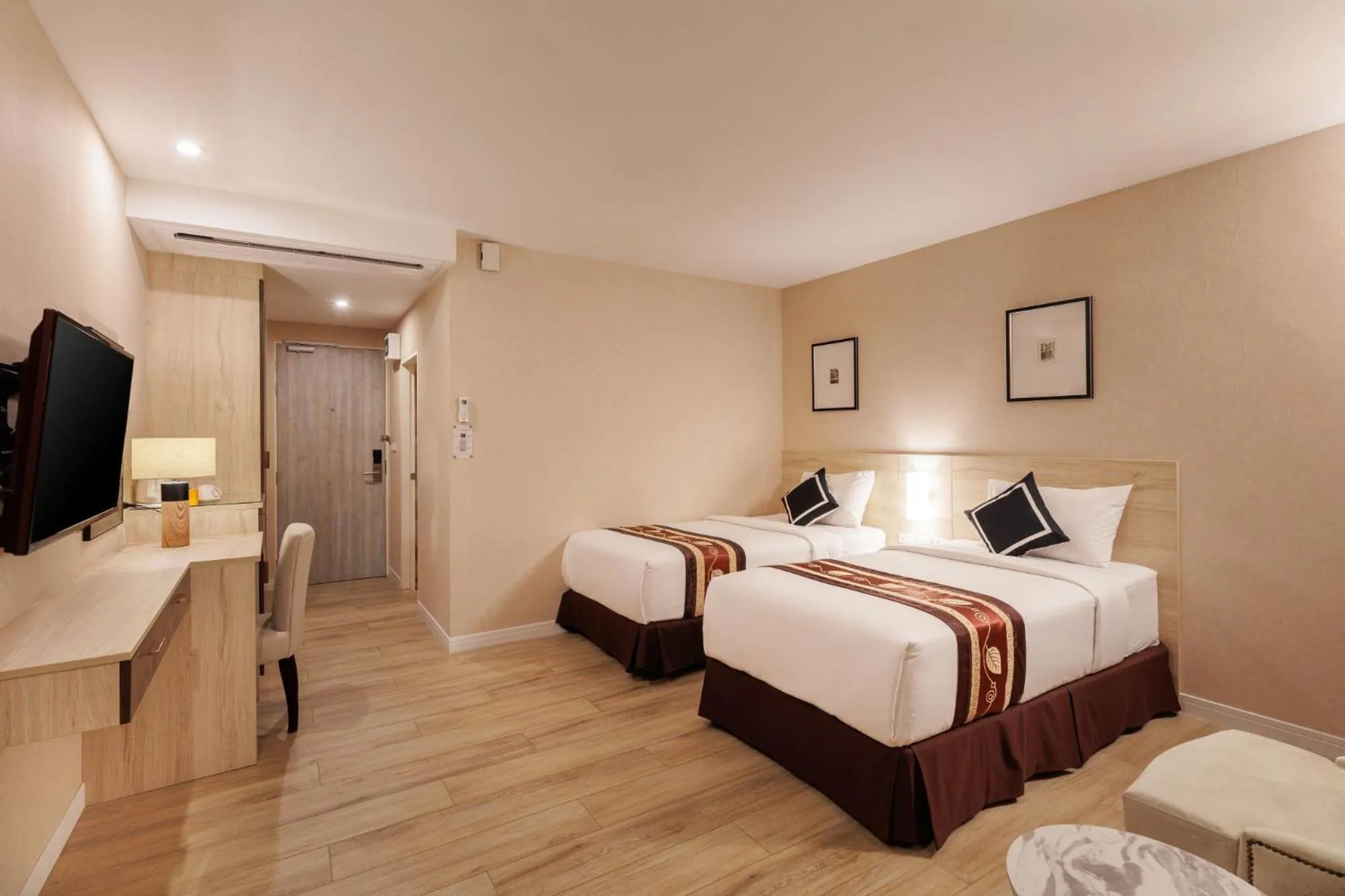 Bed in Le Cannes Hotel