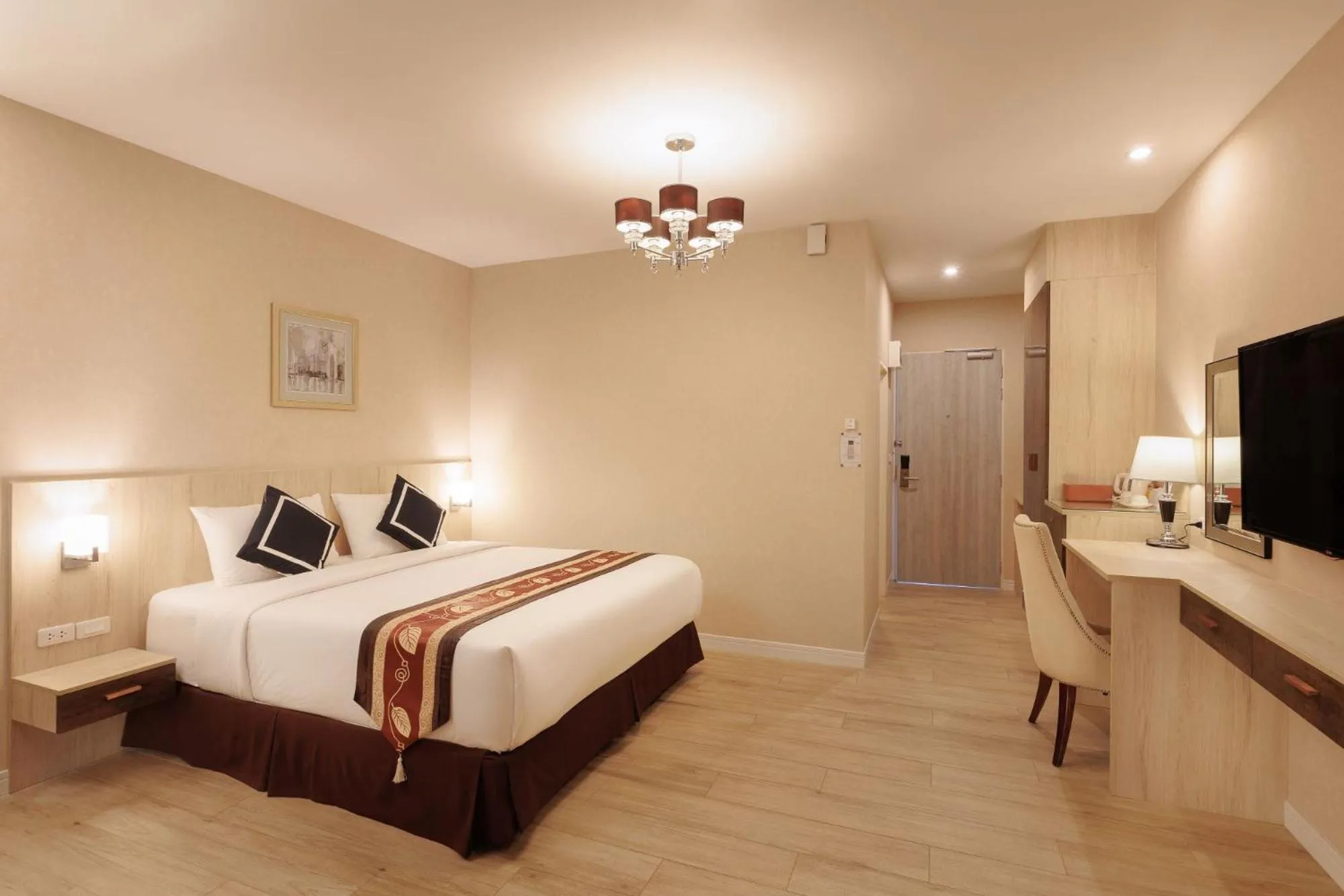 Bed in Le Cannes Hotel