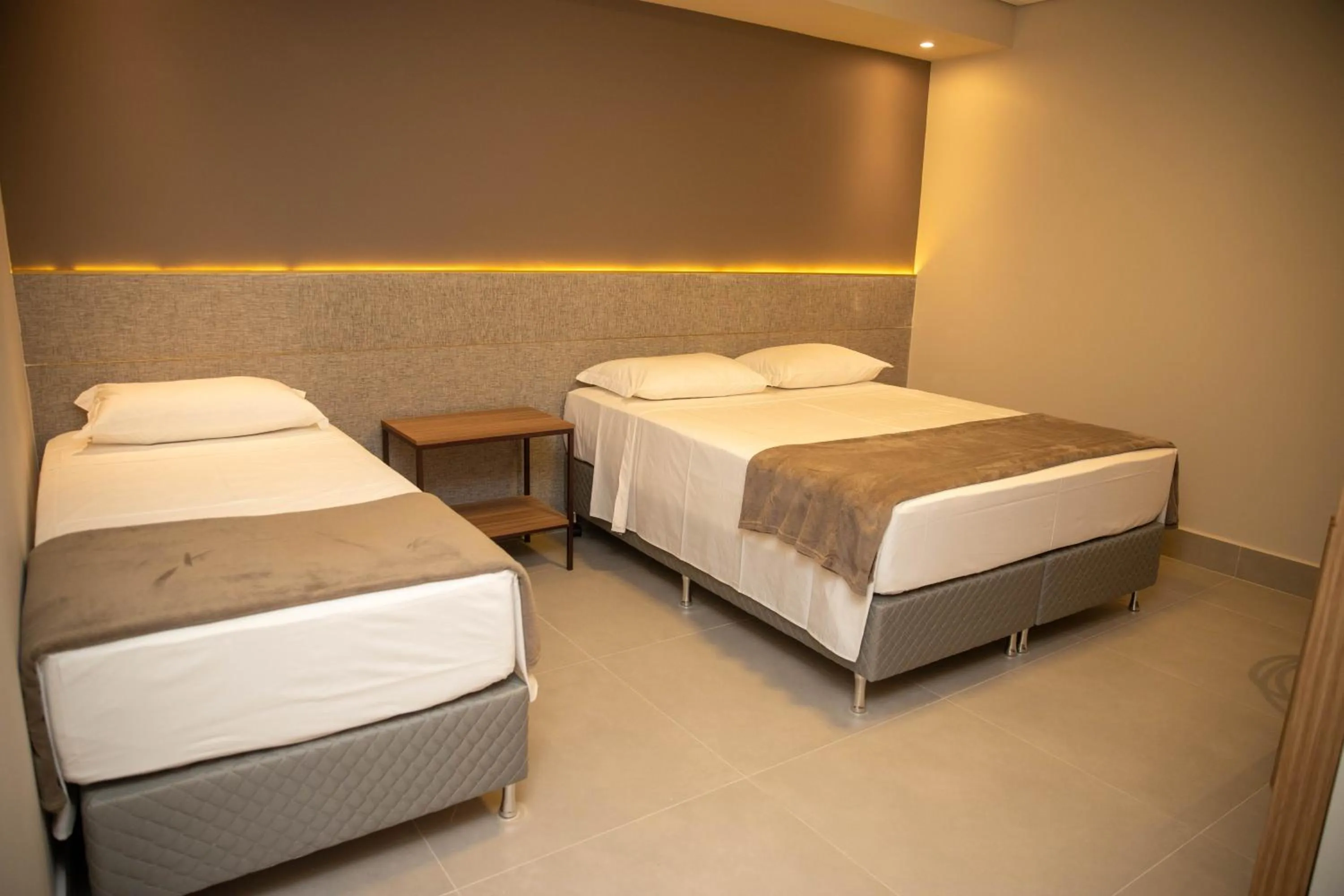 Bed in Serravita Hotel